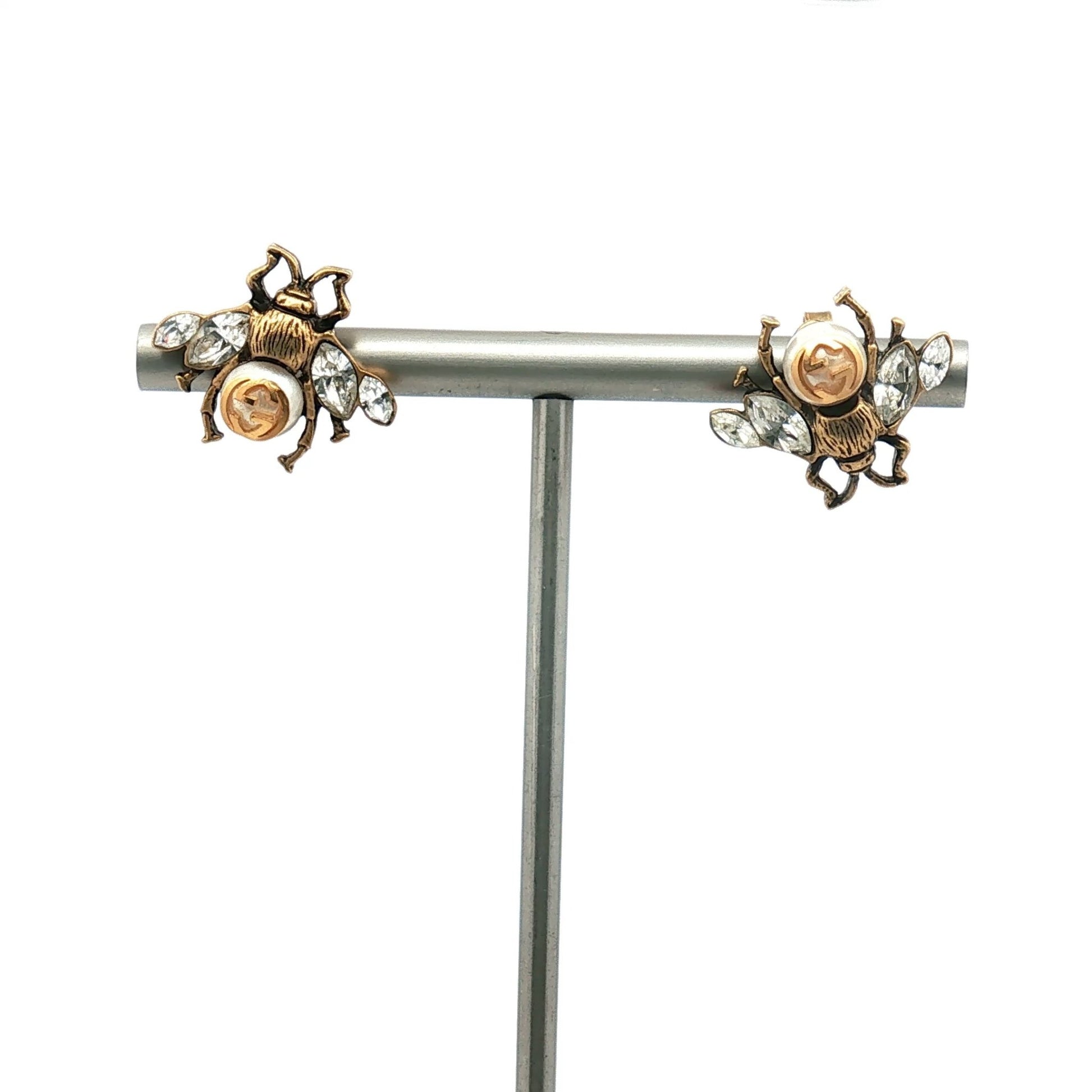 Gold & Beyond Gucci Bee Crystal Earrings featuring gold-tone jewelry with sparkling crystal bee accents.