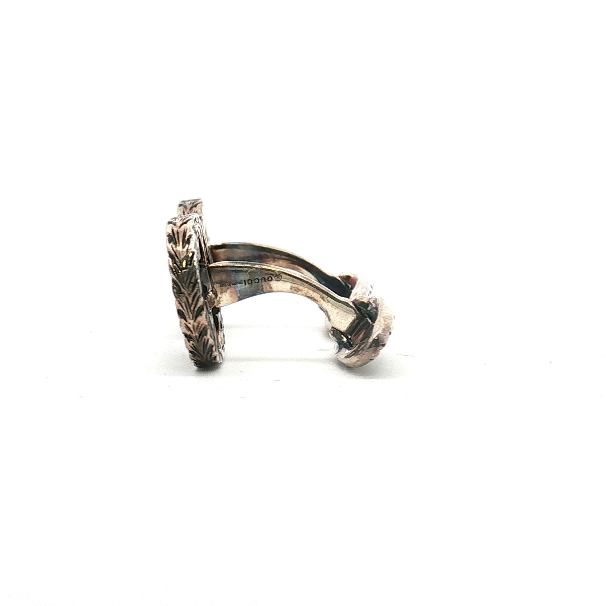 Gucci sterling silver interlocking G cufflinks with polished finish, designed as elegant jewelry accessory.