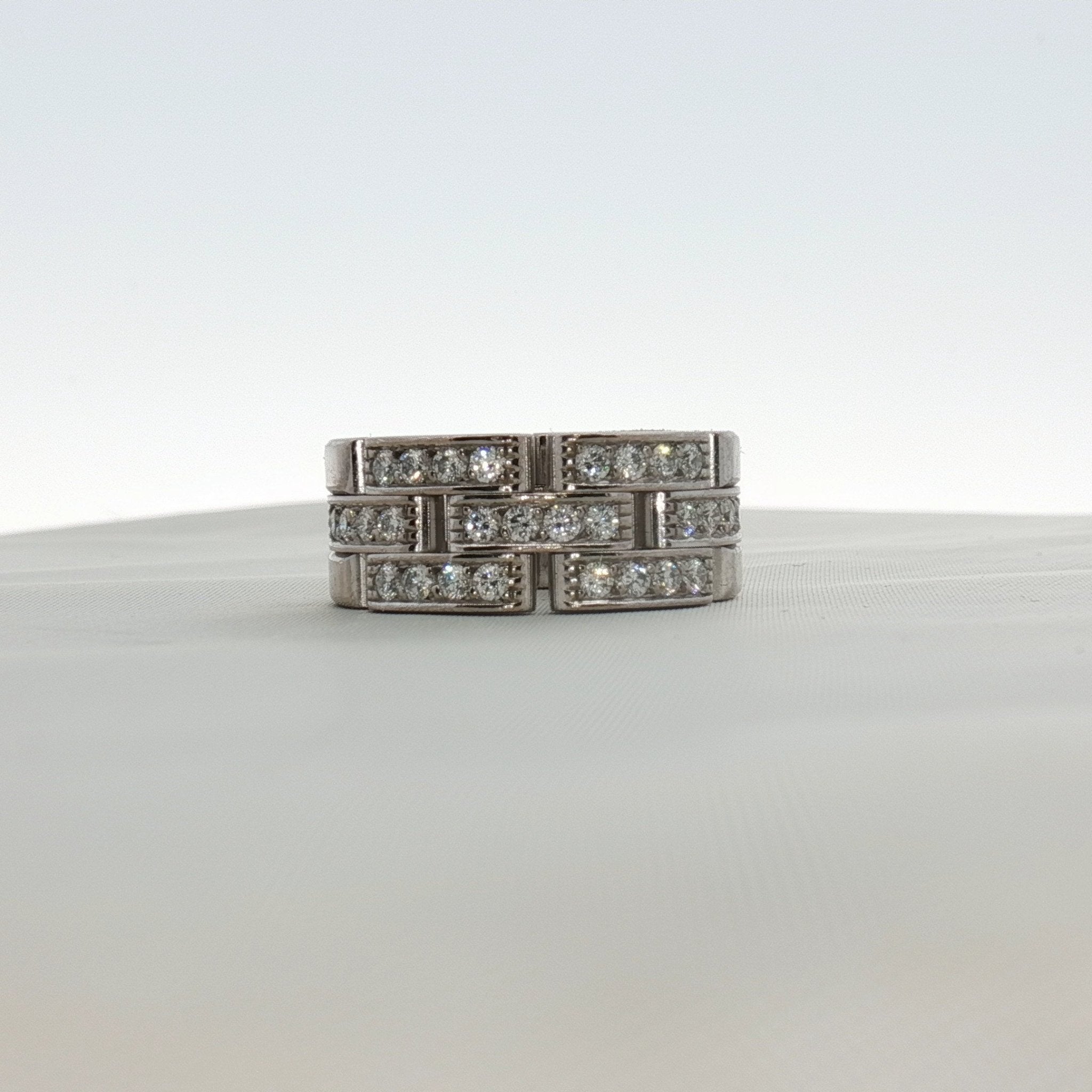 Cartier Maillon diamond ring featuring gold band with sparkling diamonds, elegant jewelry piece for special occasions
