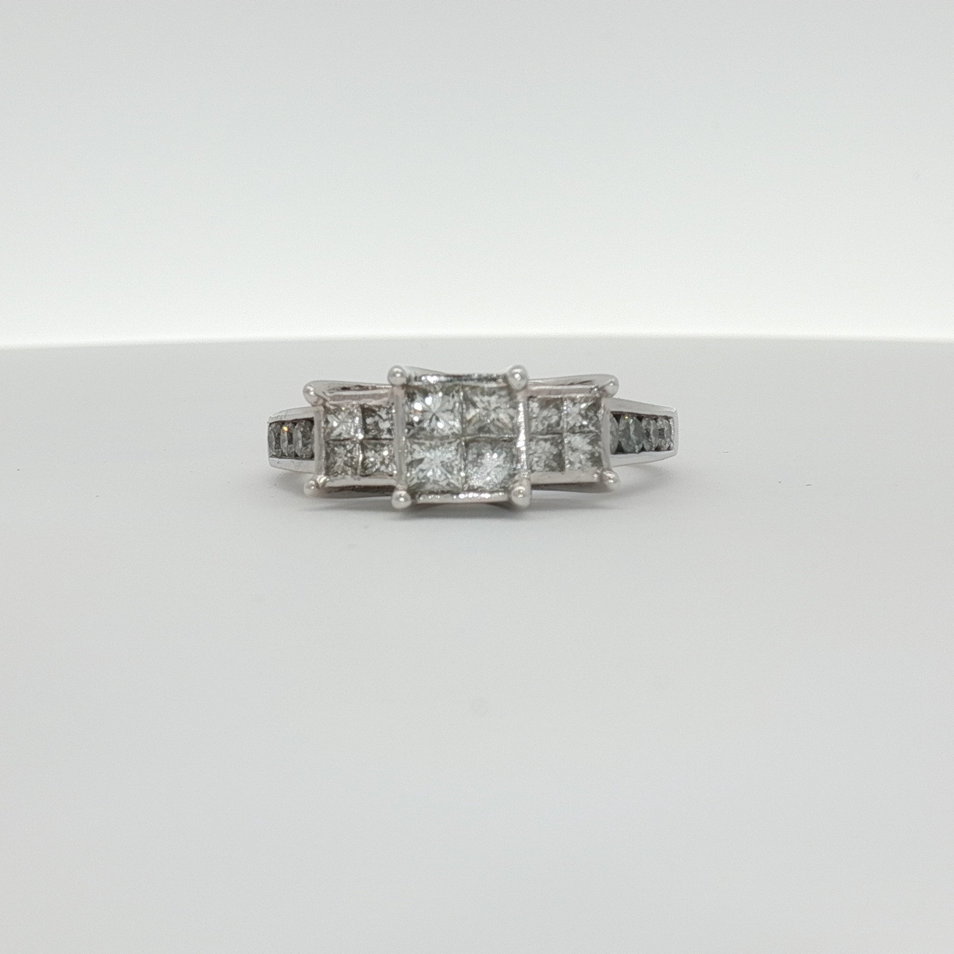 14K white gold diamond cluster ring with sparkling stones, fine jewelry from Gold & Beyond, showcasing intricate design and craftsmanship.