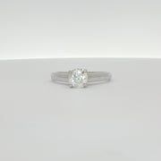 14K white gold diamond solitaire ring featuring a sparkling central diamond and a sleek band, crafted by Gold & Beyond.