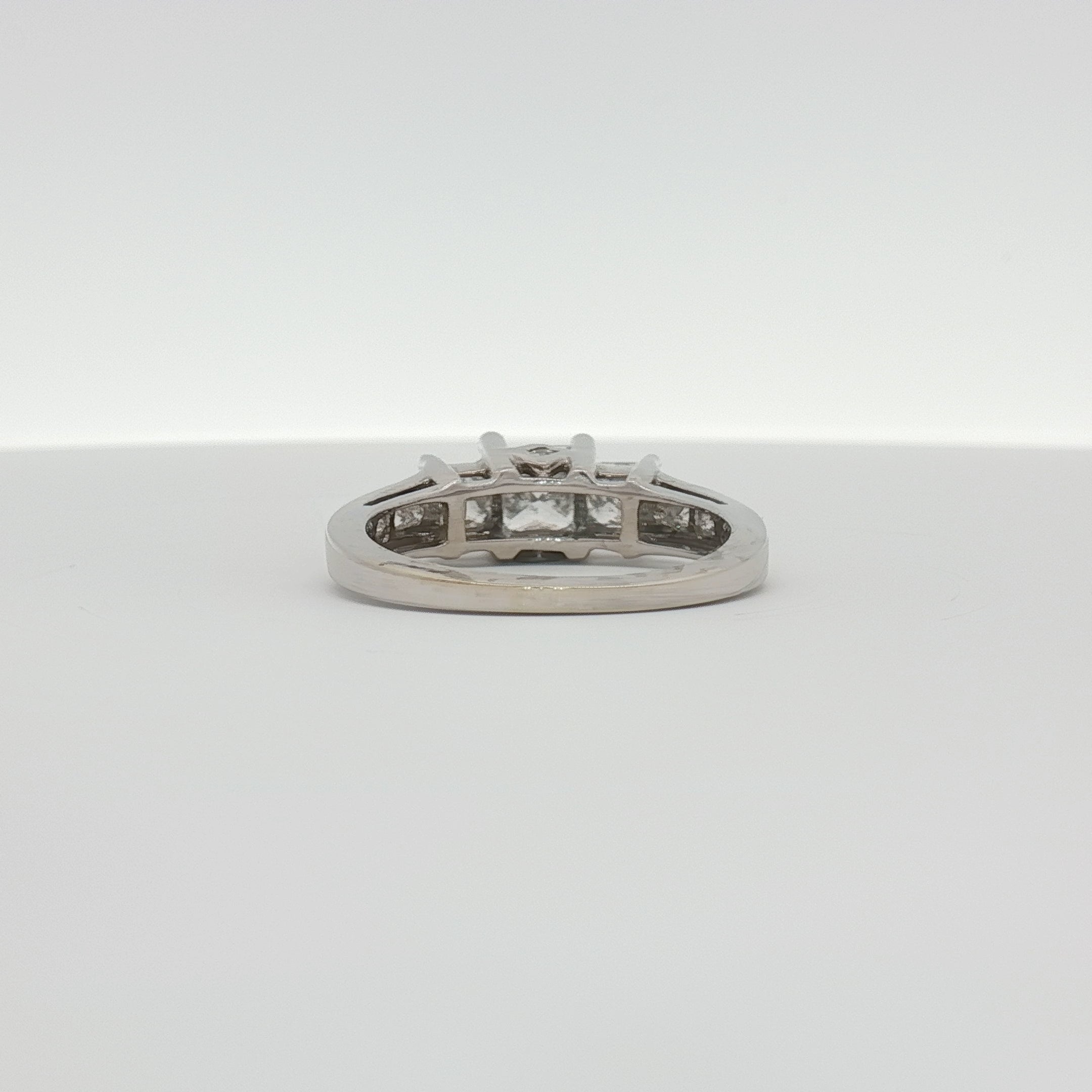 14K white gold diamond cluster ring featuring sparkling diamonds set in a elegant jewelry design.