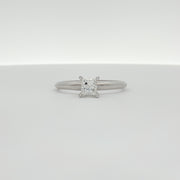 14K white gold diamond solitaire engagement ring with a central sparkling diamond and elegant band from Gold & Beyond.