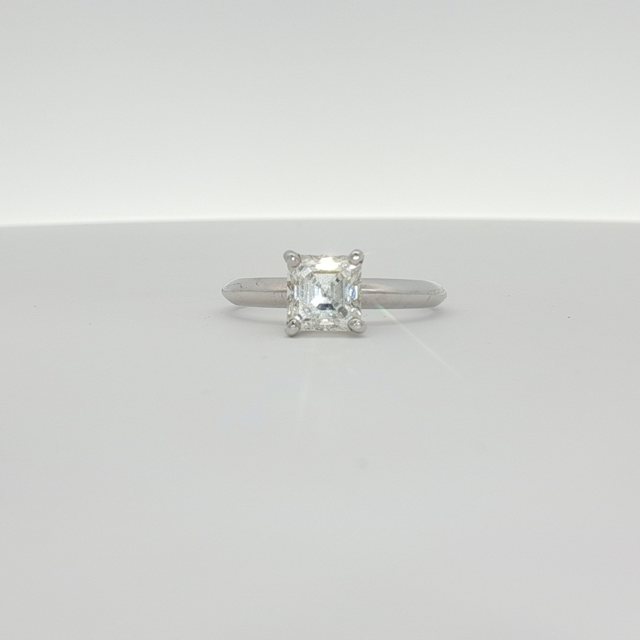 14K white gold diamond solitaire engagement ring with a sparkling center diamond and elegant band, from Gold & Beyond Jewelry.