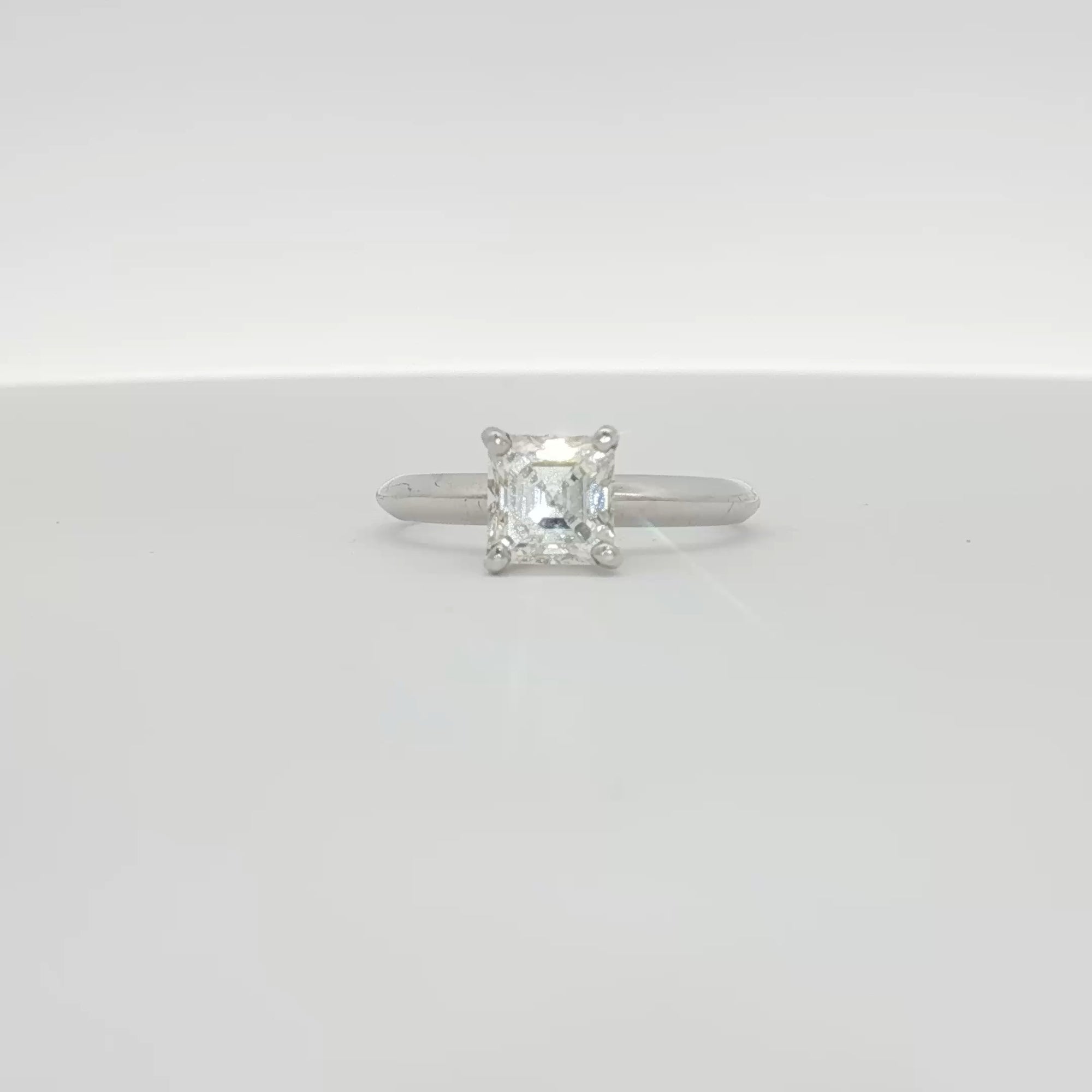 14K white gold diamond solitaire engagement ring with a round-cut diamond from Gold & Beyond, showcasing elegant jewelry craftsmanship.