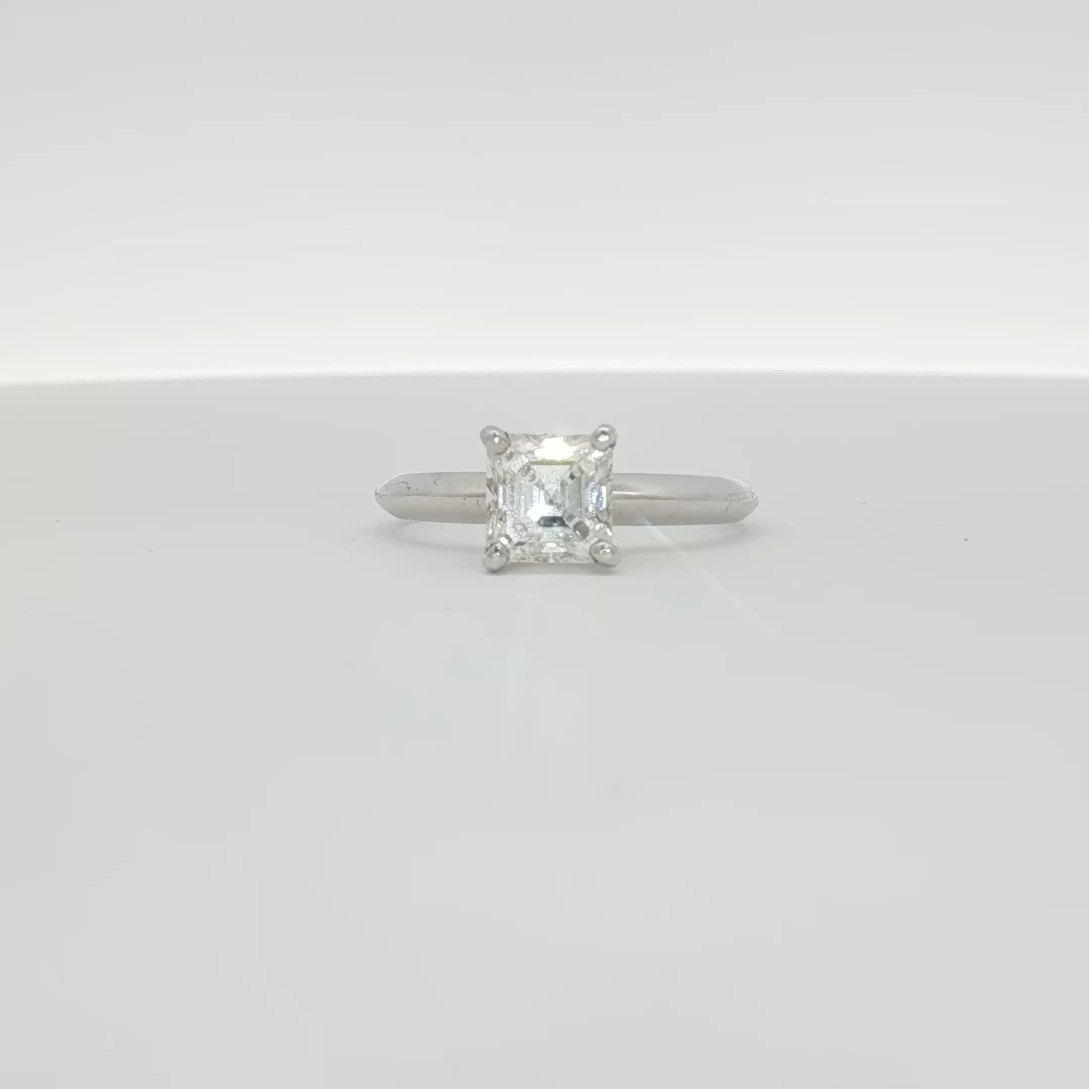 14K white gold diamond solitaire engagement ring with a round-cut diamond from Gold & Beyond, showcasing elegant jewelry craftsmanship.