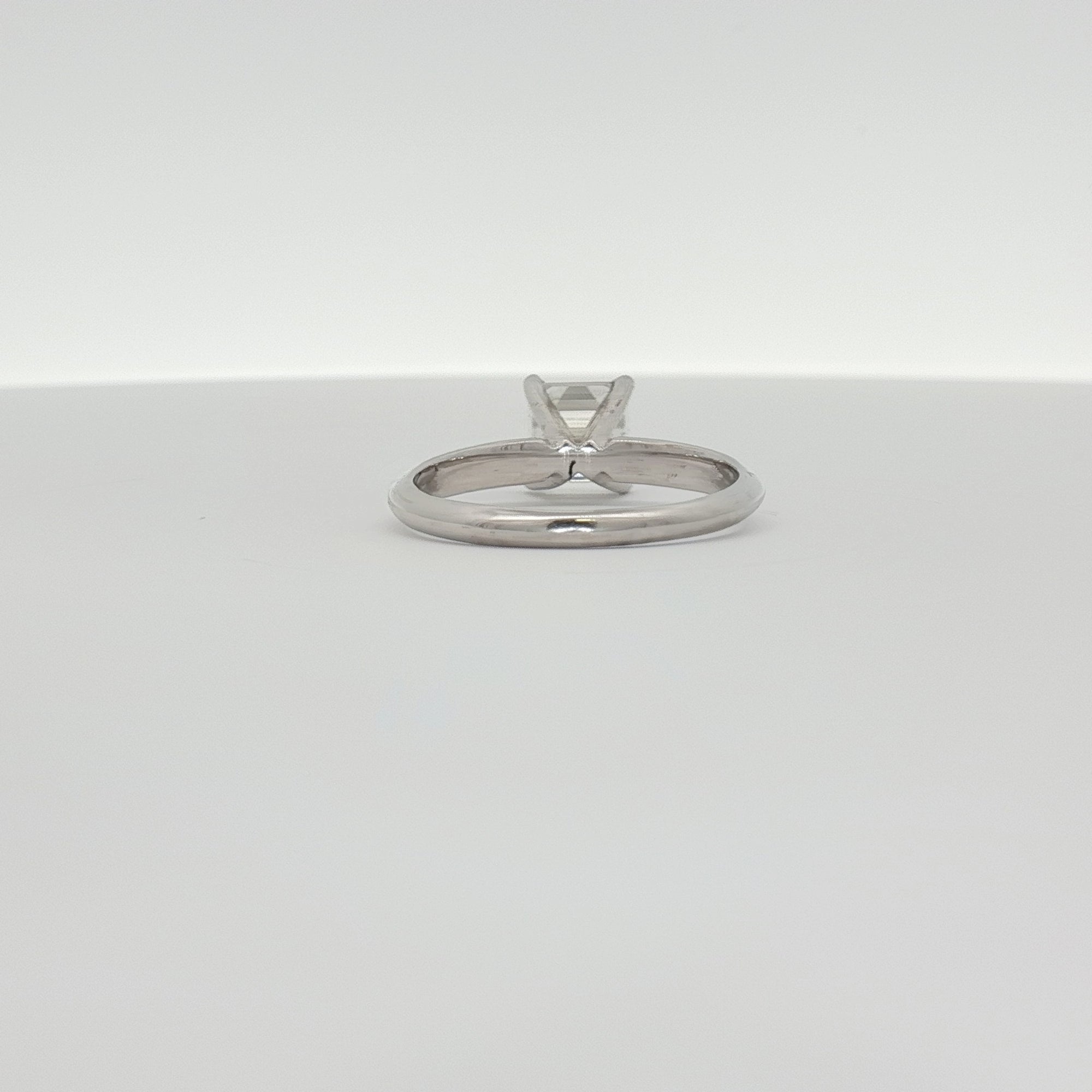 14K white gold diamond solitaire engagement ring with a sparkling center stone, crafted by Gold & Beyond.