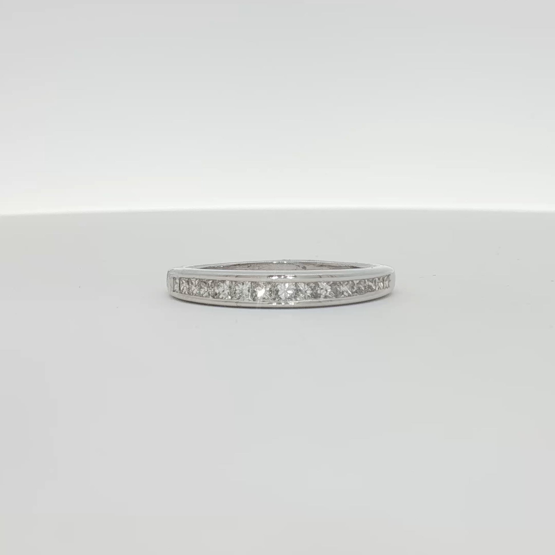14K white gold diamond wedding band with sparkling diamonds and polished finish, crafted by Gold & Beyond.