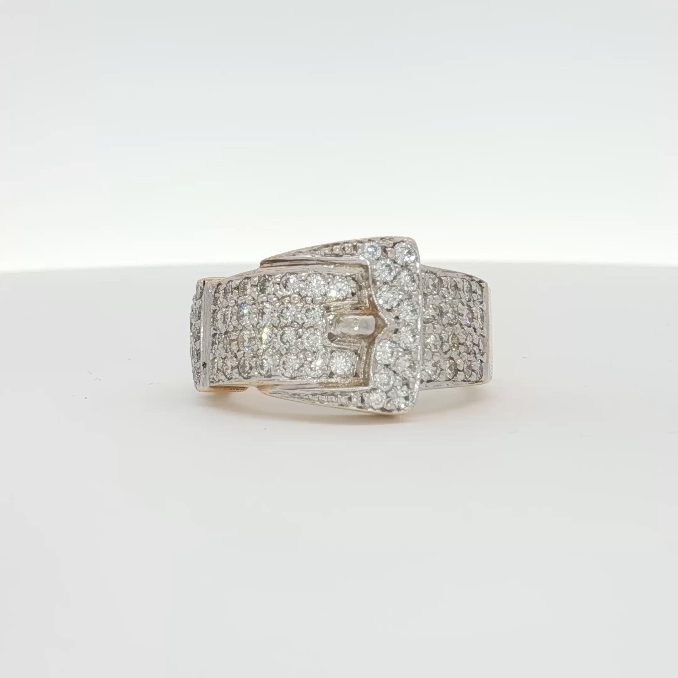 14K yellow gold diamond belt buckle ring featuring sparkling diamonds and intricate design, crafted by Gold & Beyond.