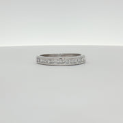10K white gold diamond wedding band with sparkling diamonds, crafted by Gold & Beyond, showcasing elegant jewelry design.