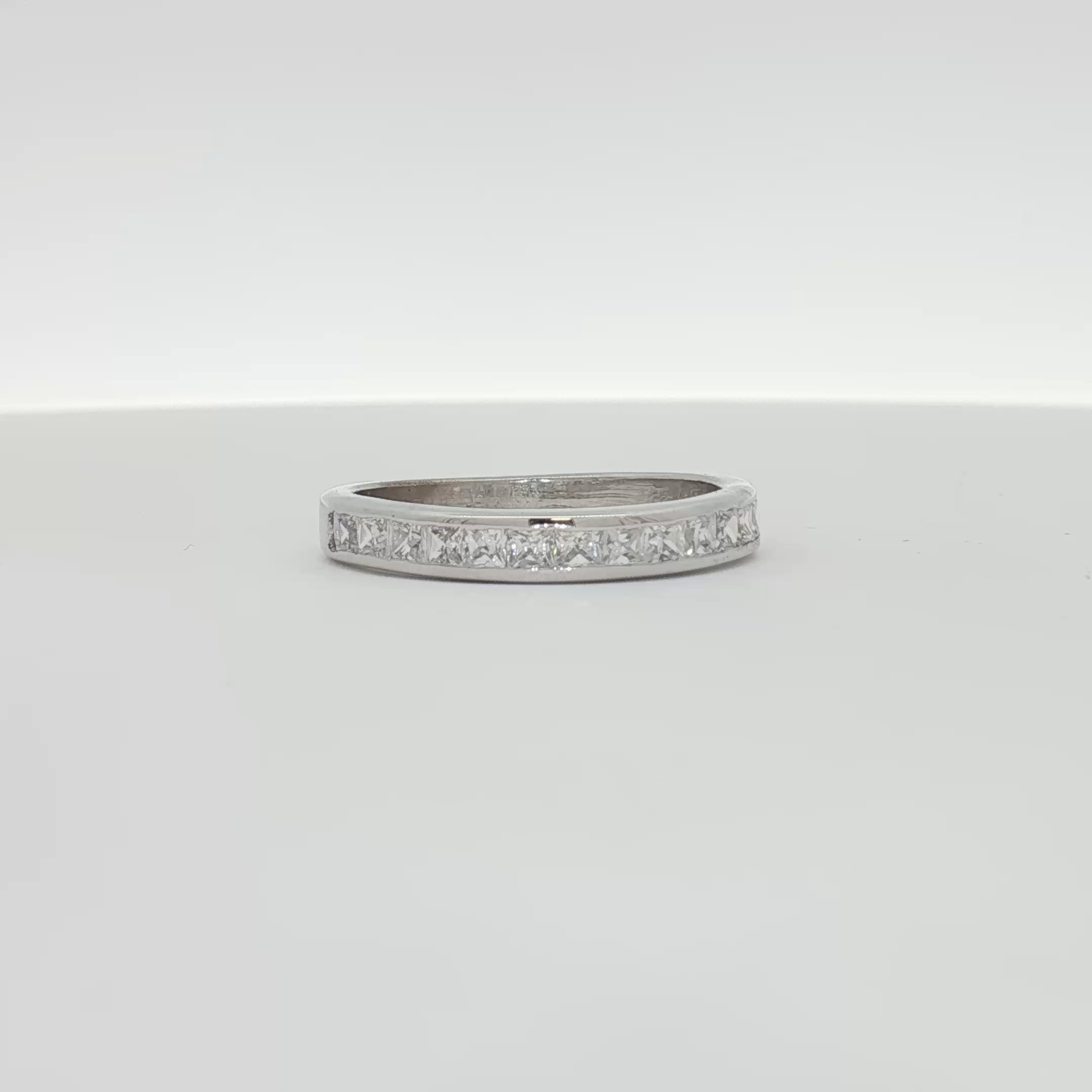 Elegant 10K white gold diamond wedding band featuring sparkling diamonds and a polished finish from Gold & Beyond jewelry collection.