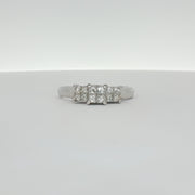 14K white gold diamond engagement ring with a sparkling center stone and side accents, crafted by Gold & Beyond.