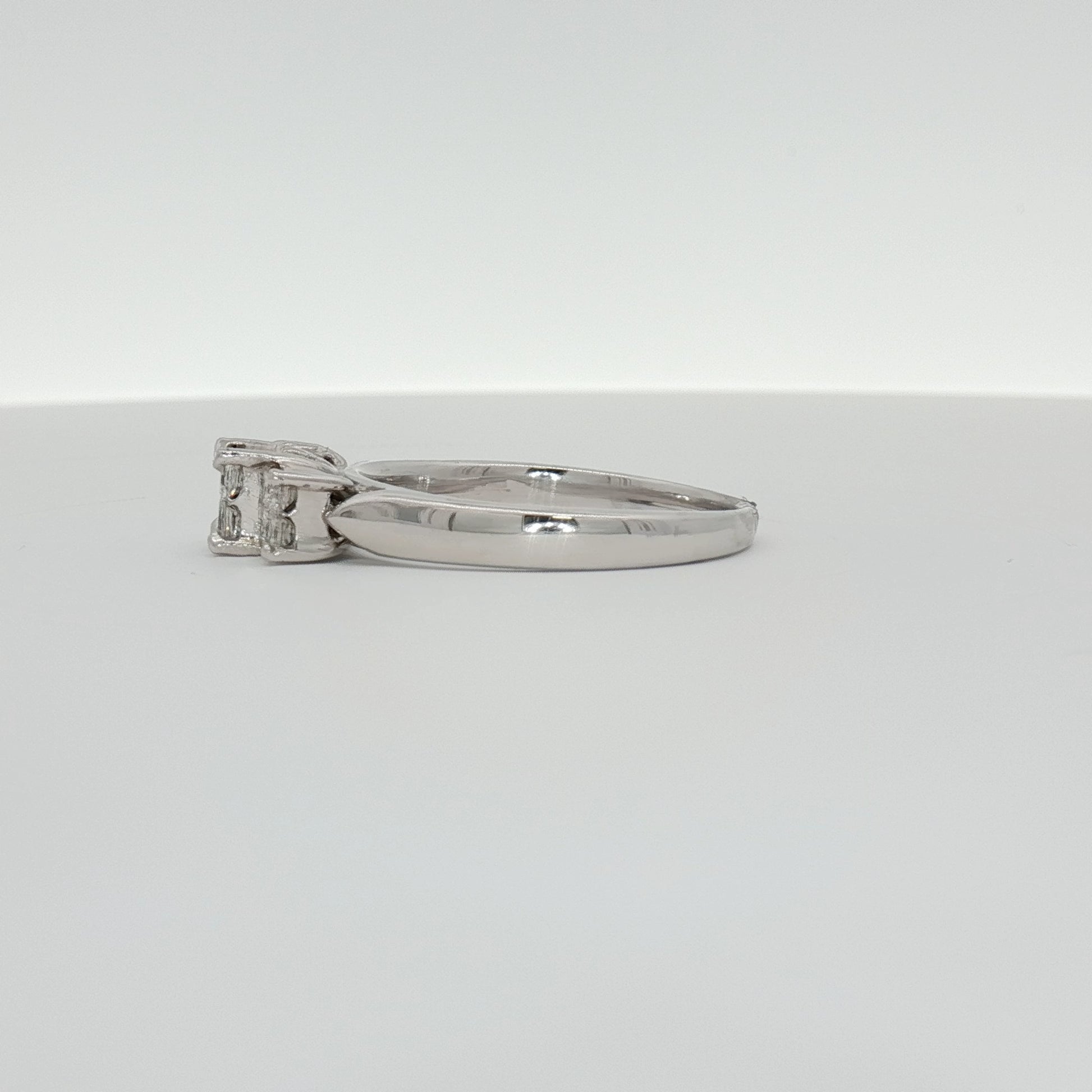 14K white gold diamond engagement ring featuring a central diamond and delicate band from Gold & Beyond jewelry collection.