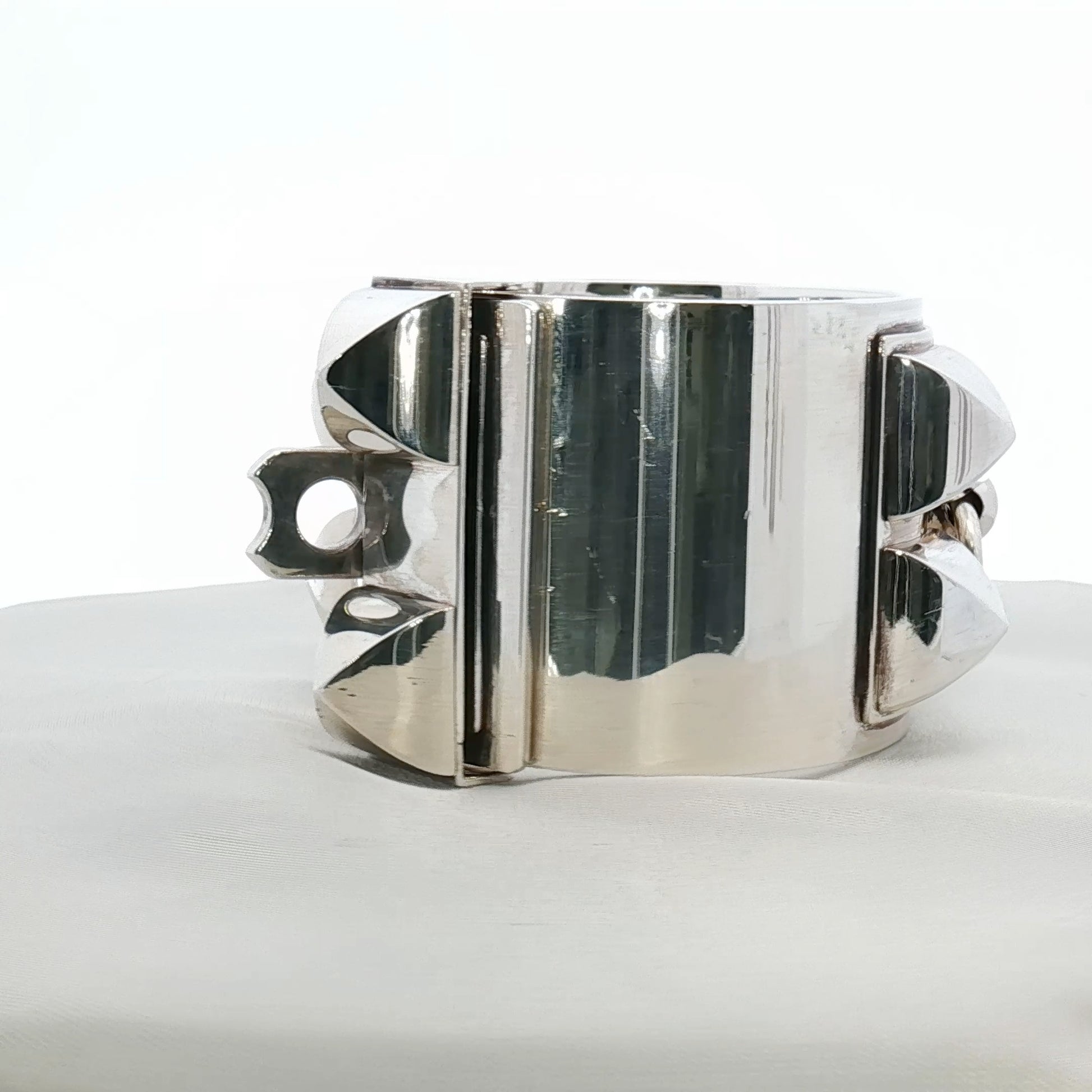 Hermès Collier de Chien STE Cuff bracelet from Gold & Beyond, featuring bold jewelry design with metal detailing and luxurious finish.