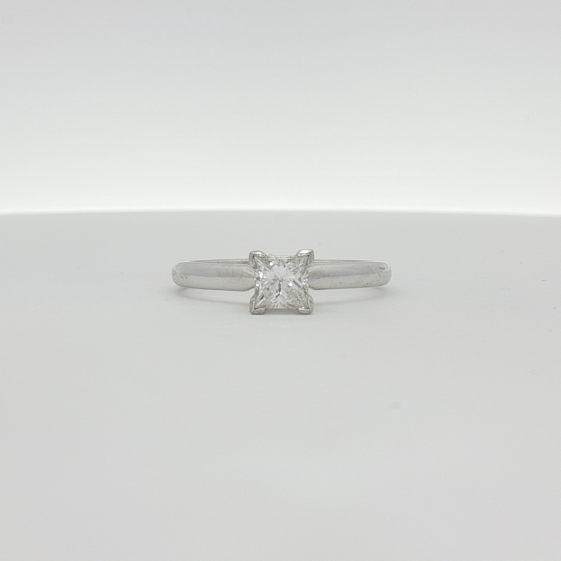 14K white gold diamond solitaire engagement ring with a round brilliant-cut diamond from Gold & Beyond.