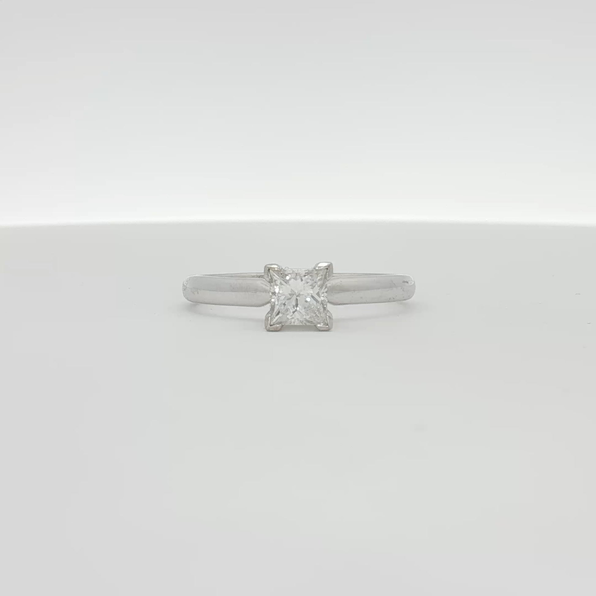 14K white gold diamond solitaire engagement ring with a central sparkling diamond and elegant band from Gold & Beyond.