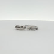 10K white gold diamond twist band ring showcasing sparkling diamonds and elegant design from Gold & Beyond jewelry collection.