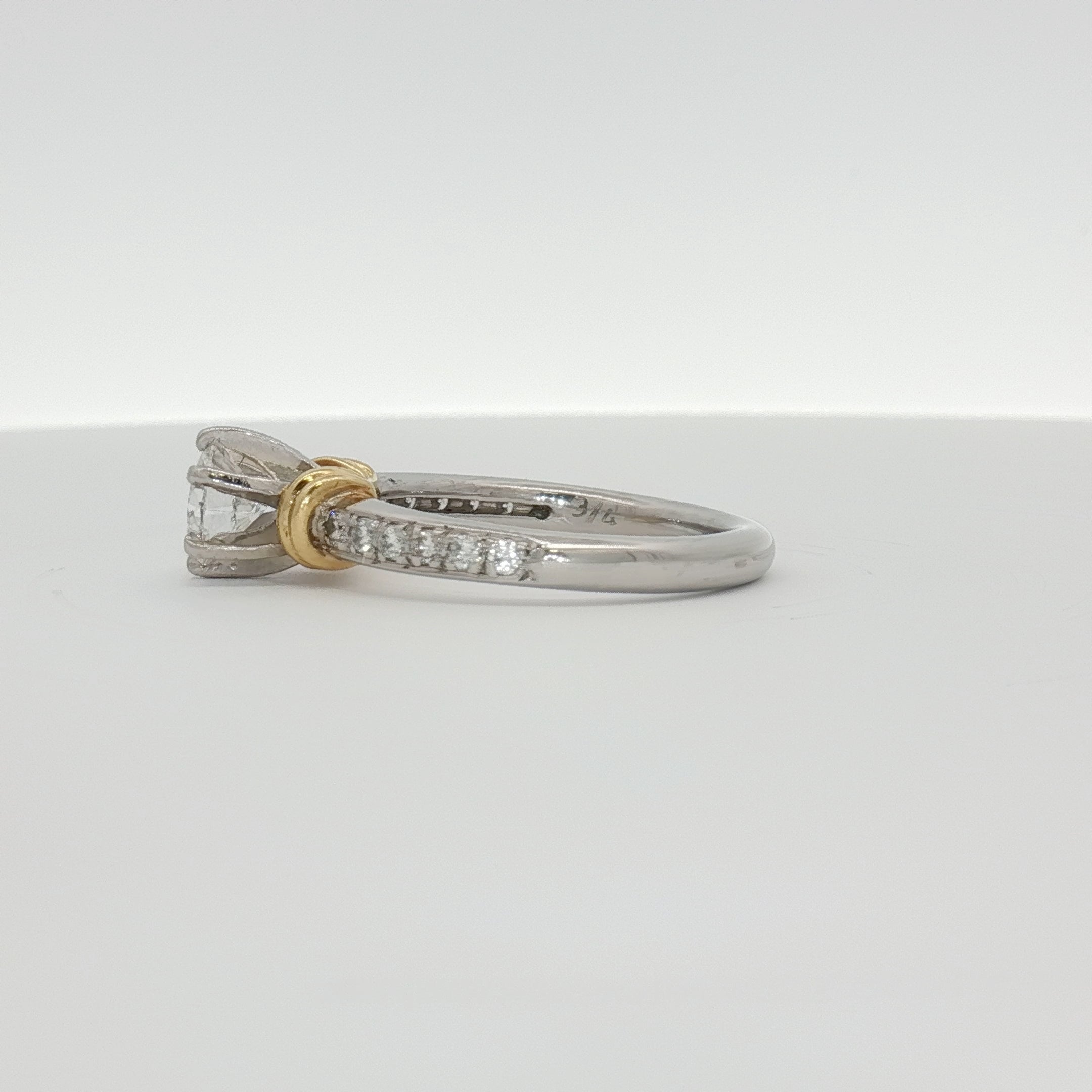 Platinum diamond engagement ring from Gold & Beyond showcasing a sparkling diamond set in a sleek platinum band.