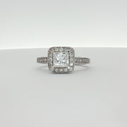 Elegant 18K white gold diamond ring from Gold & Beyond showcasing a sparkling diamond centerpiece and sleek band design.