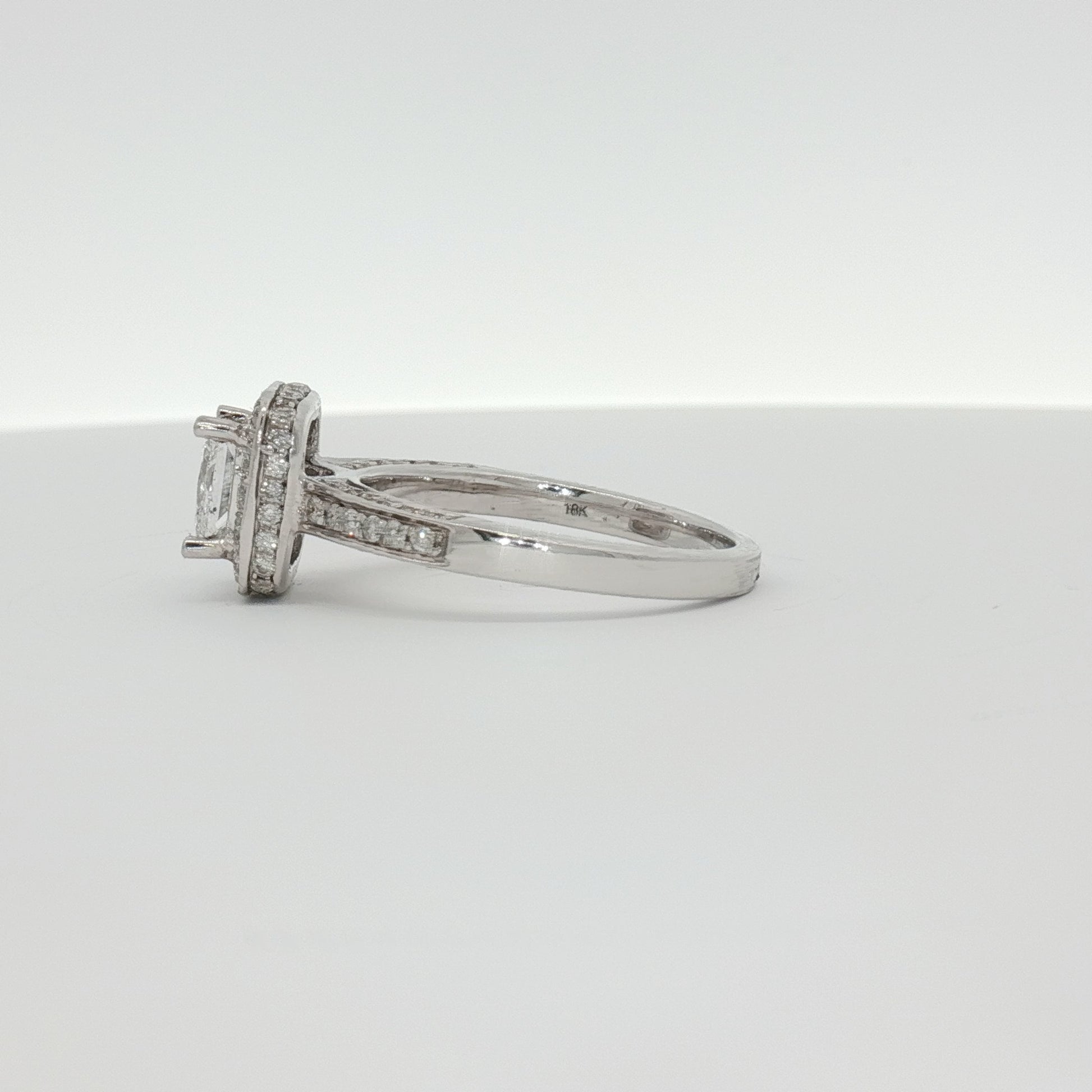 18K white gold diamond ring from Gold & Beyond featuring sparkling diamonds set in elegant jewelry design.