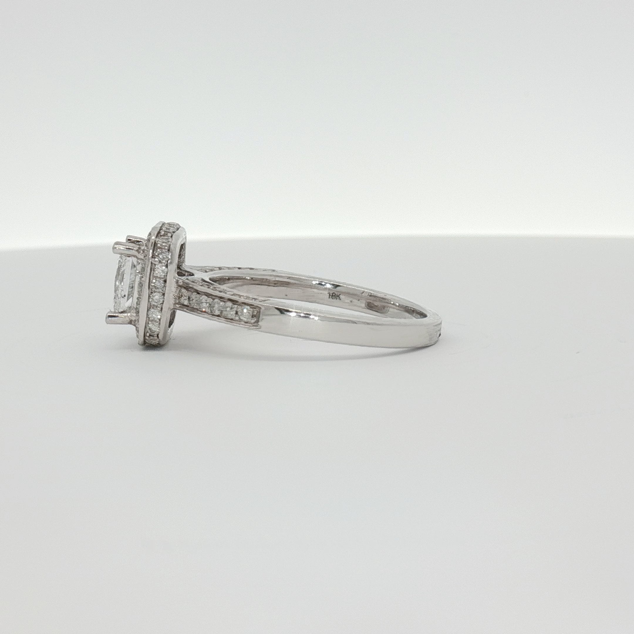 18K white gold diamond ring from Gold & Beyond featuring sparkling diamonds set in elegant jewelry design.