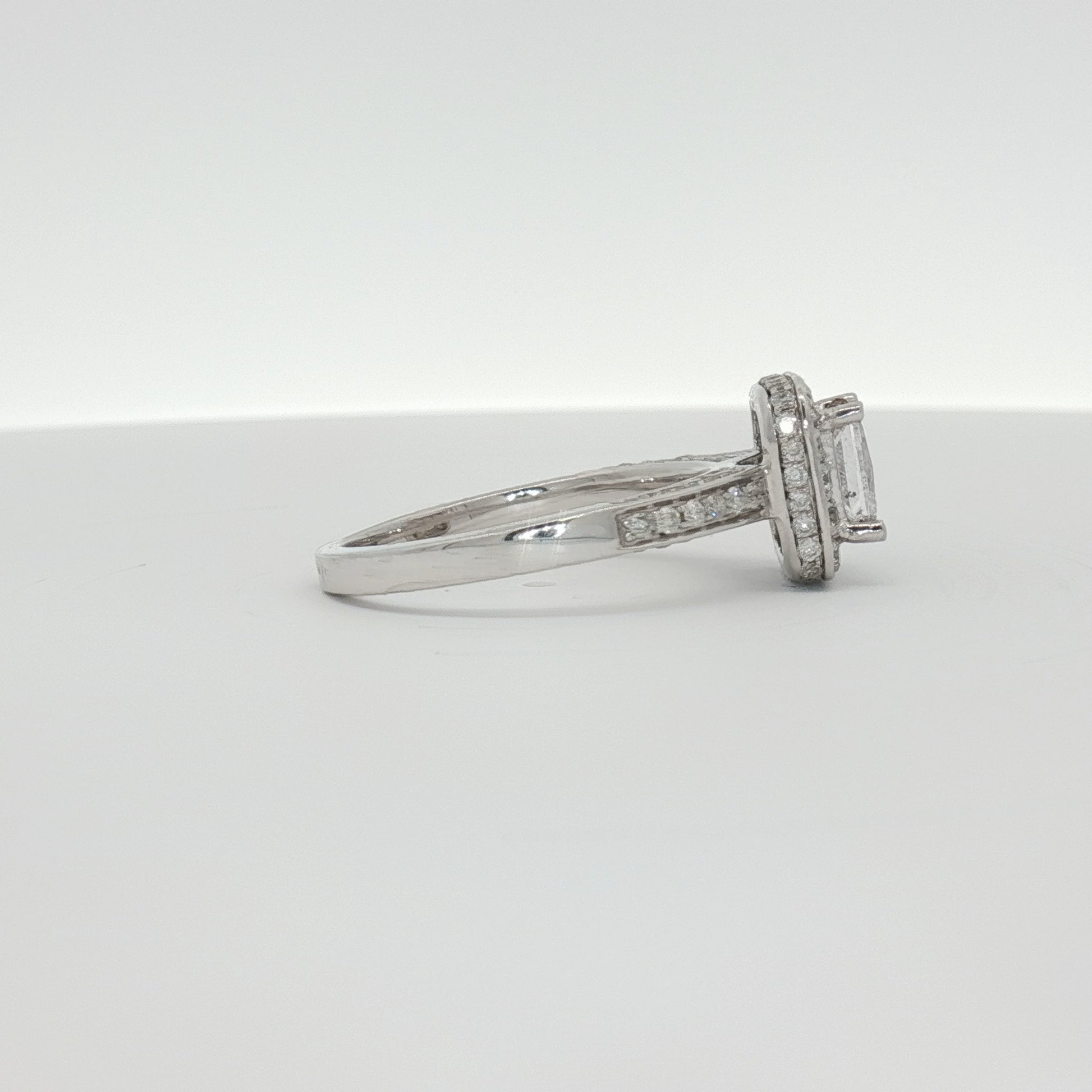 18K white gold diamond ring from Gold & Beyond featuring sparkling diamonds and a sleek, elegant design for fine jewelry.