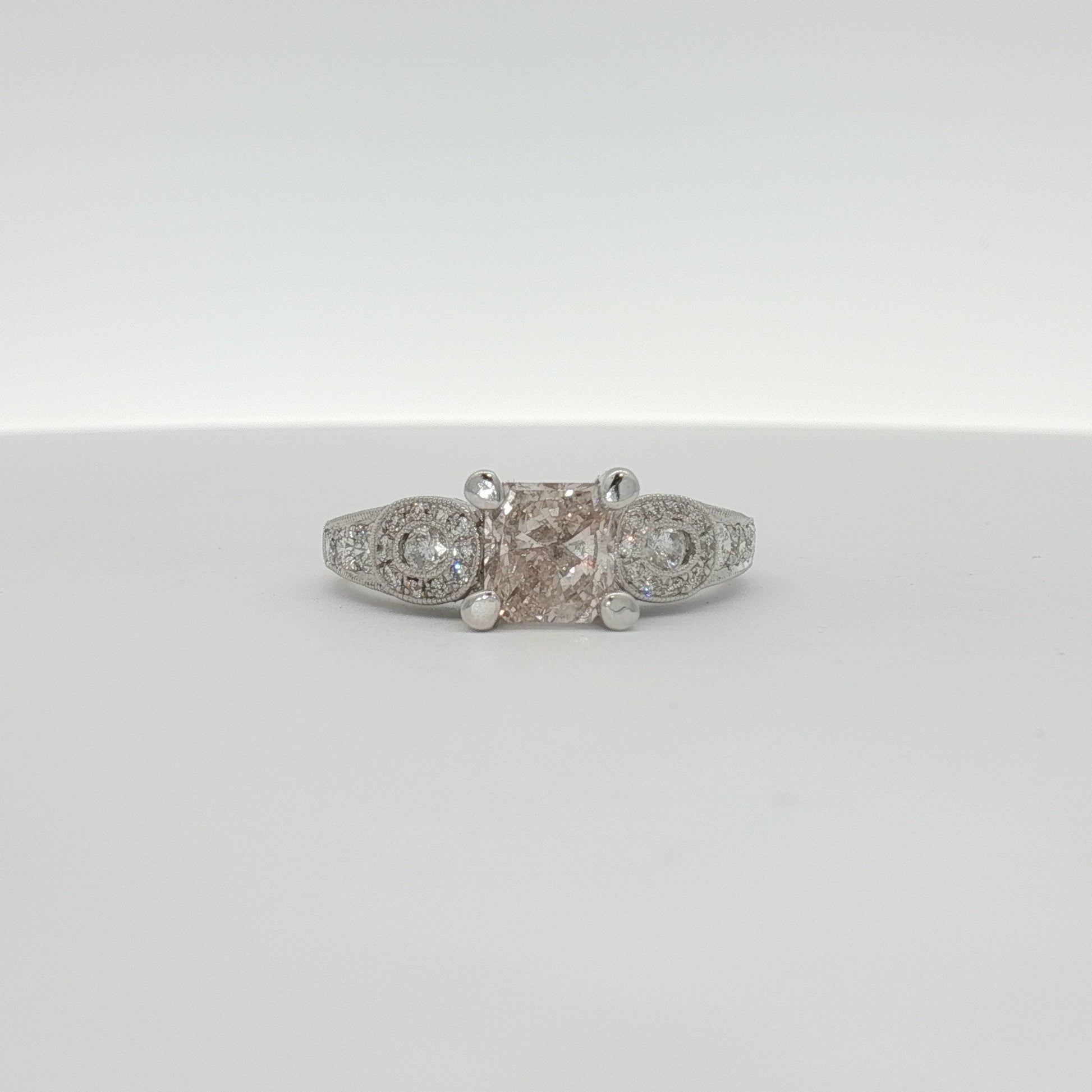 Elegant 18K white gold diamond ring featuring sparkling diamonds, crafted by Gold & Beyond jewelry brand.