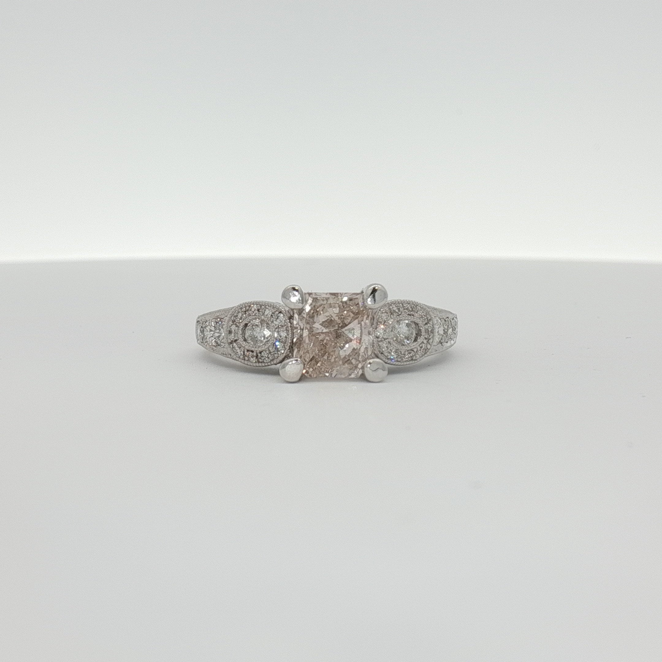 Elegant 18K white gold diamond ring featuring sparkling diamonds, crafted by Gold & Beyond for sophisticated jewelry style.