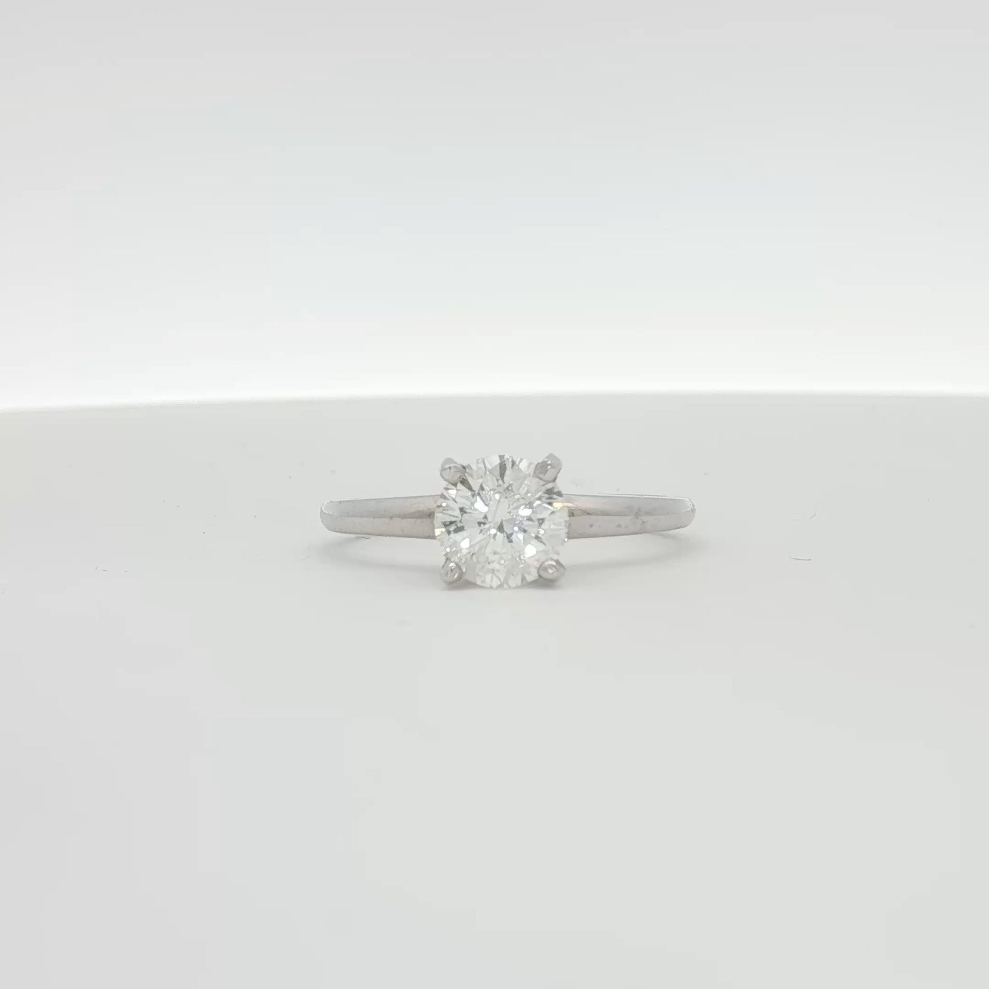 14K white gold diamond engagement ring with a central solitaire diamond, crafted by Gold & Beyond.