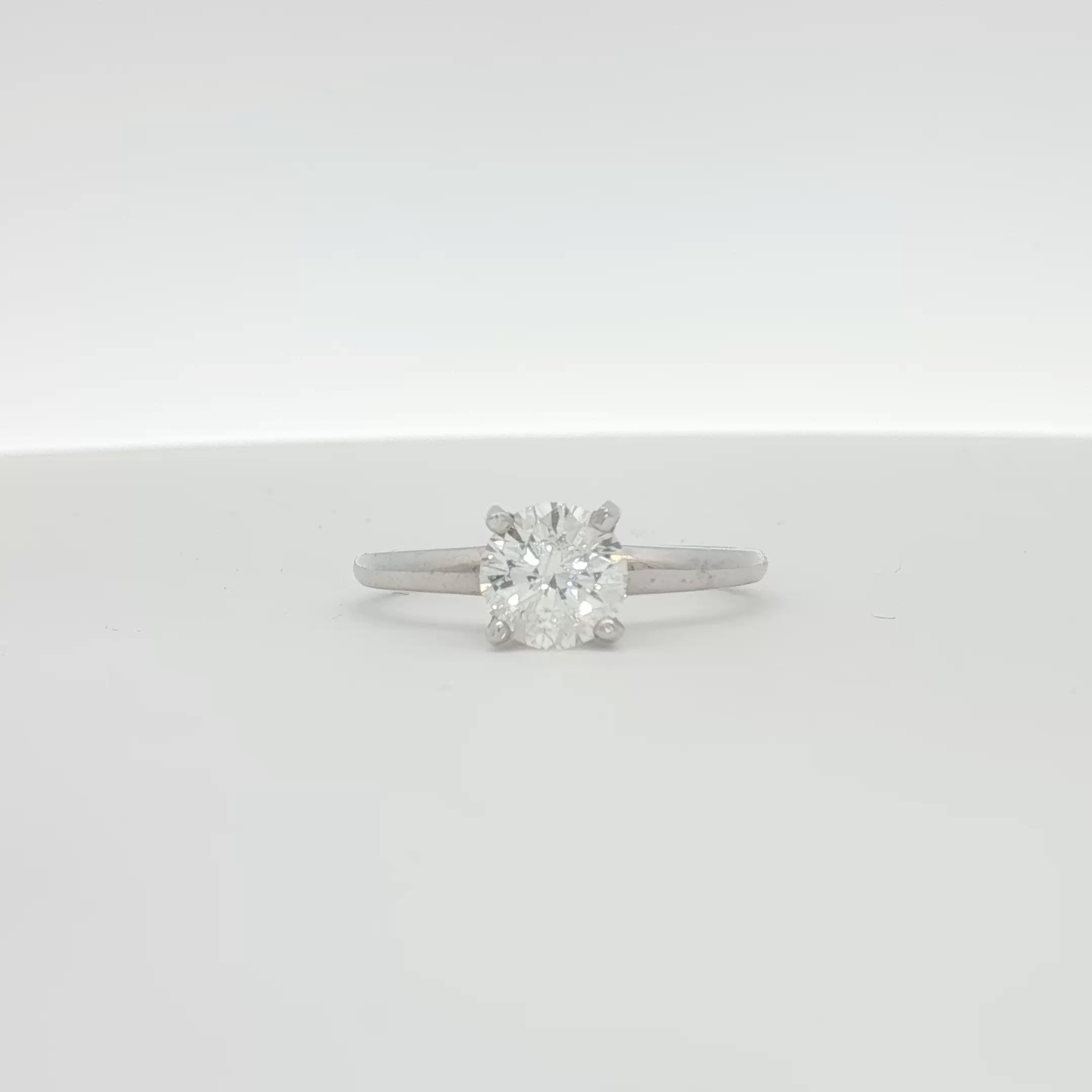 14K white gold diamond engagement ring with a central solitaire diamond, crafted by Gold & Beyond.