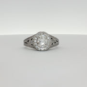 14K white gold diamond engagement ring with a central sparkling diamond and elegant band, crafted by Gold & Beyond.
