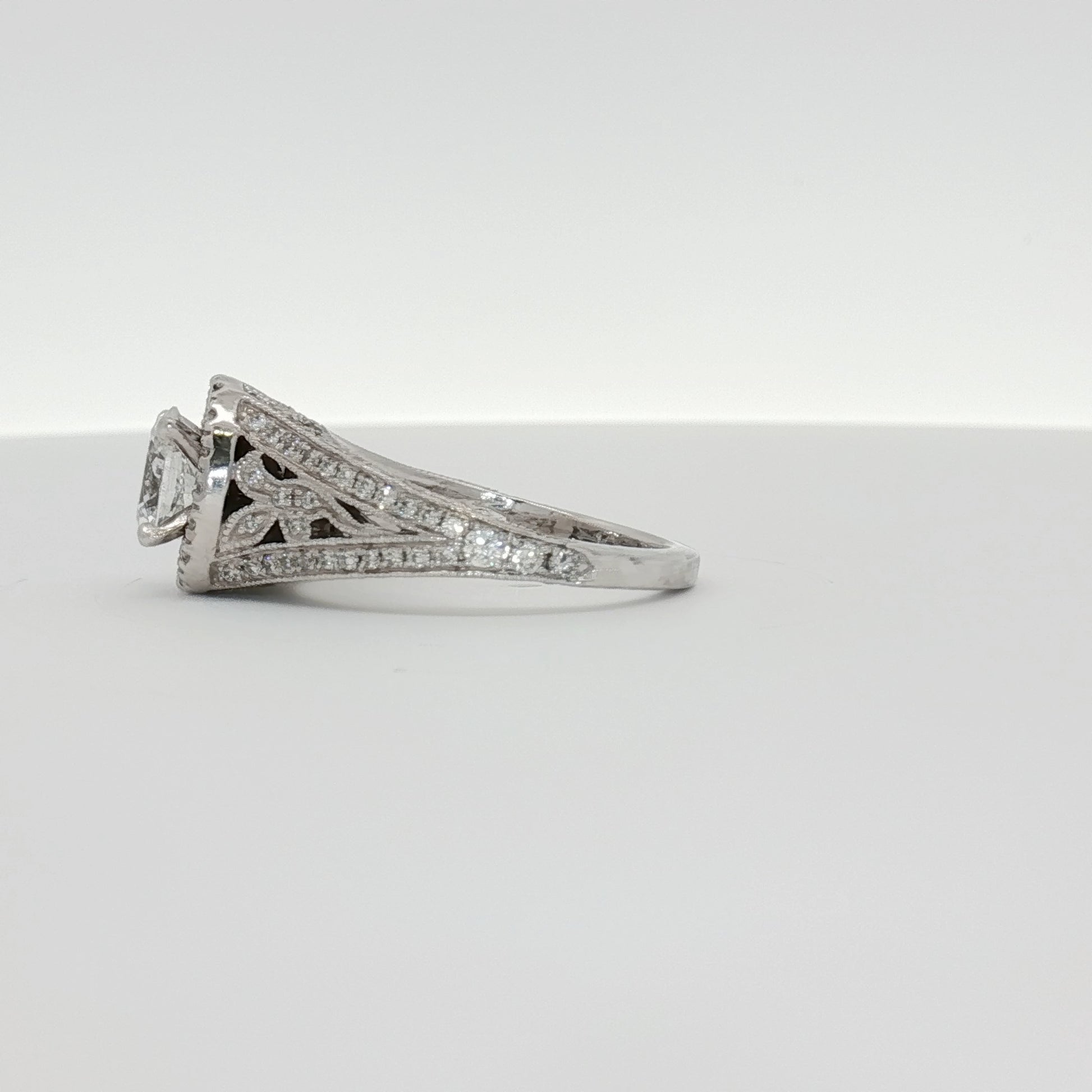 14K white gold diamond engagement ring with sparkling center stone and delicate band, from Gold & Beyond jewelry collection.