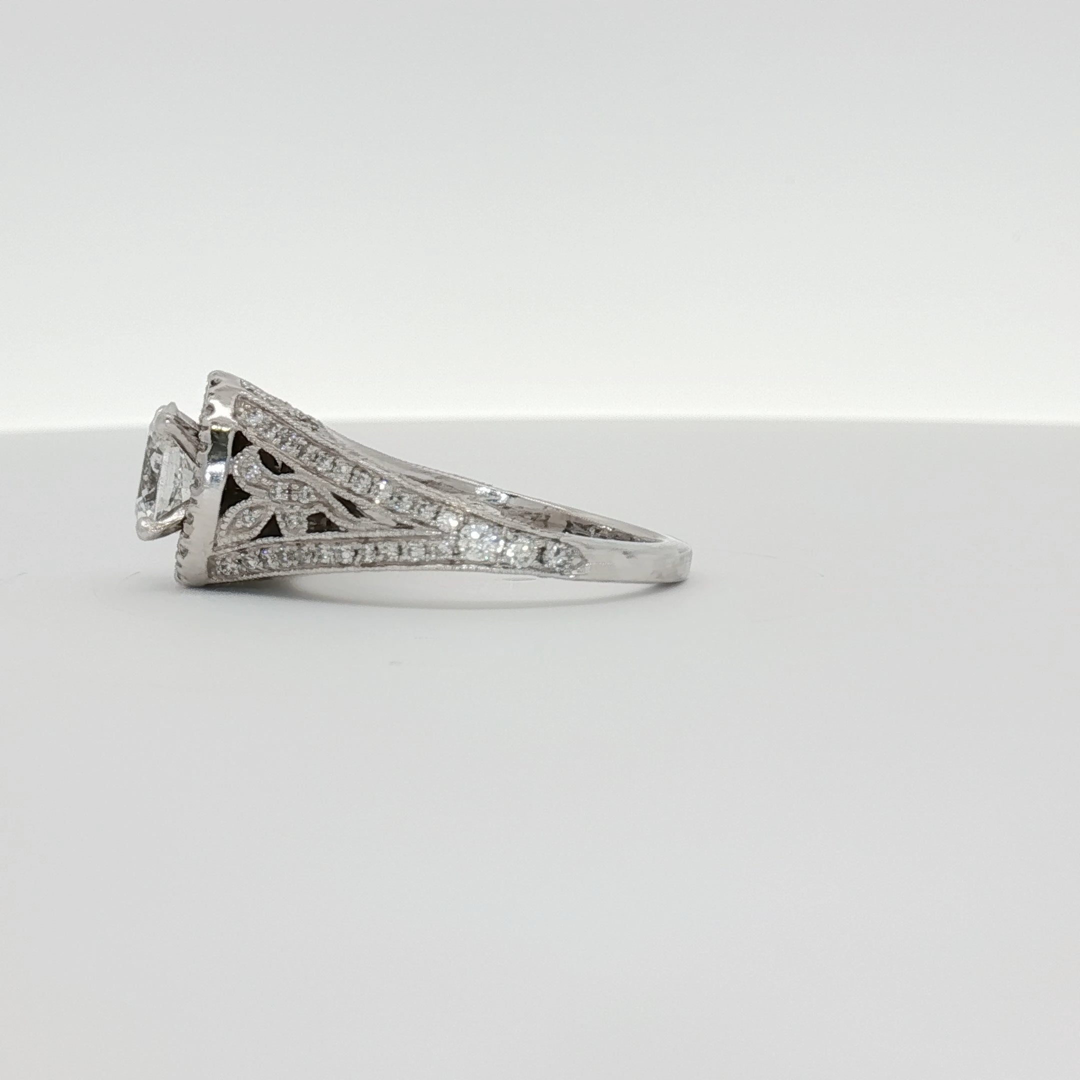 14K white gold diamond engagement ring with sparkling center stone and delicate band, from Gold & Beyond jewelry collection.