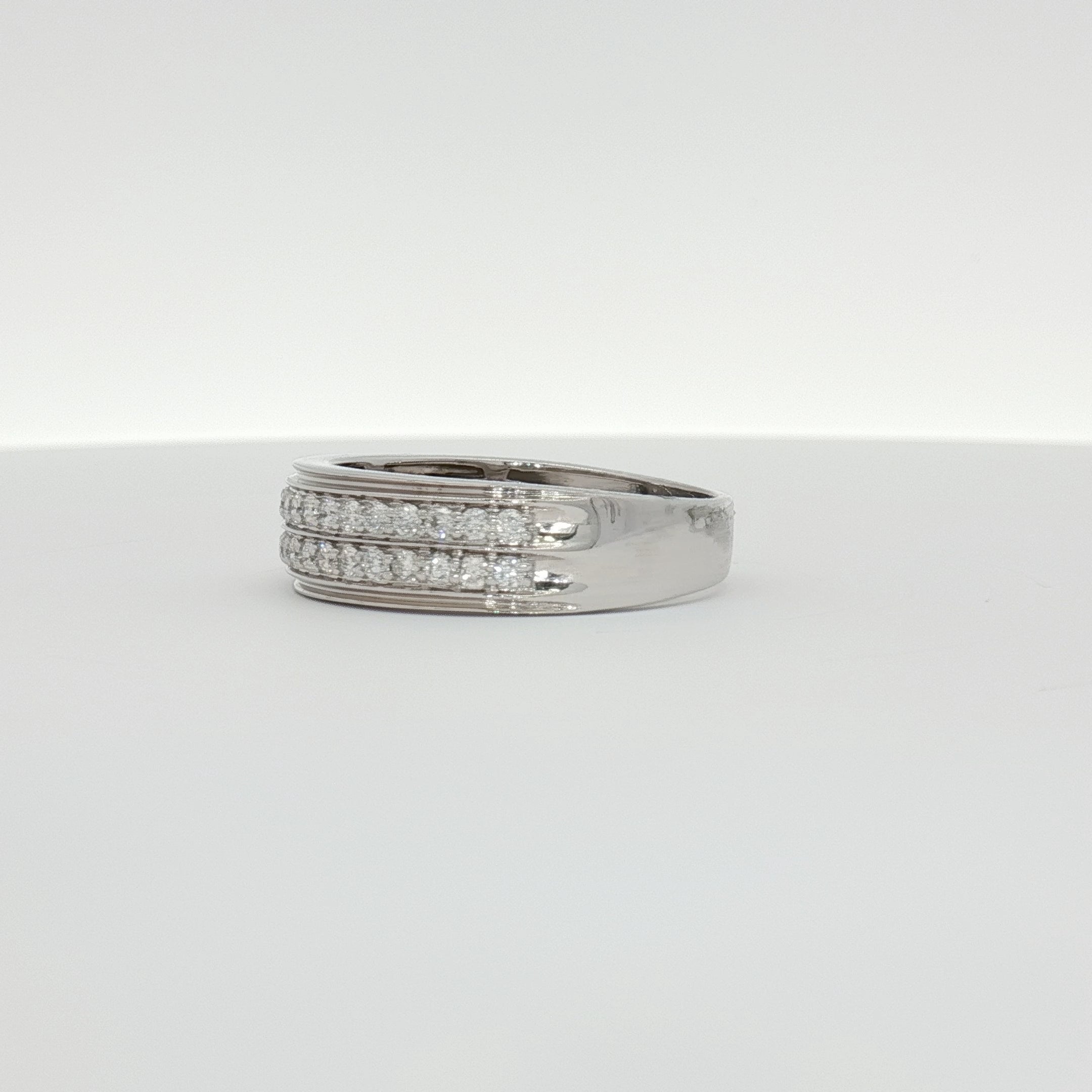 14K white gold diamond men's band ring with sparkling diamonds, crafted by Gold & Beyond, showcasing elegant jewelry design.