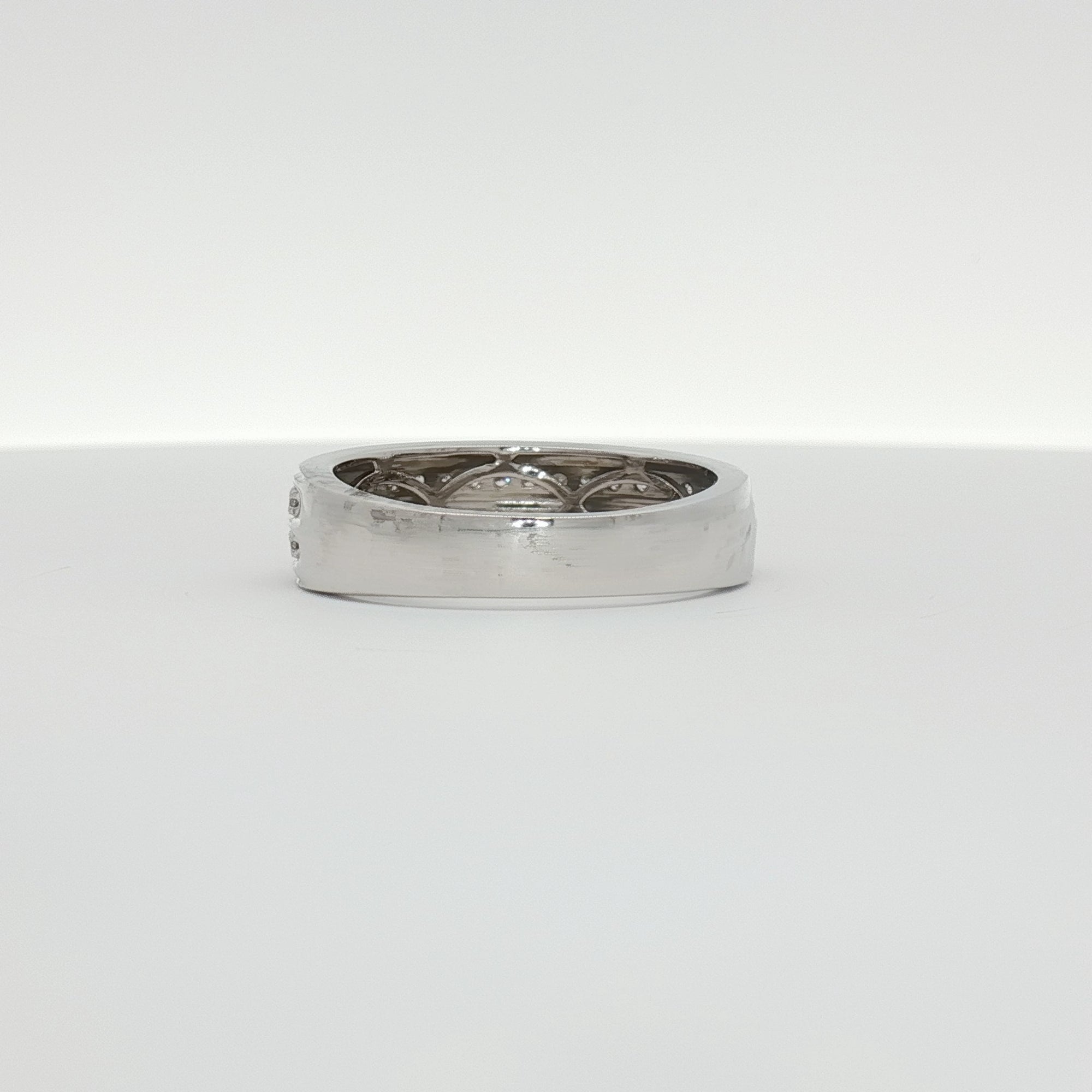 14K white gold diamond gentleman’s band ring with a polished finish, showcasing elegant design and sparkling diamonds.