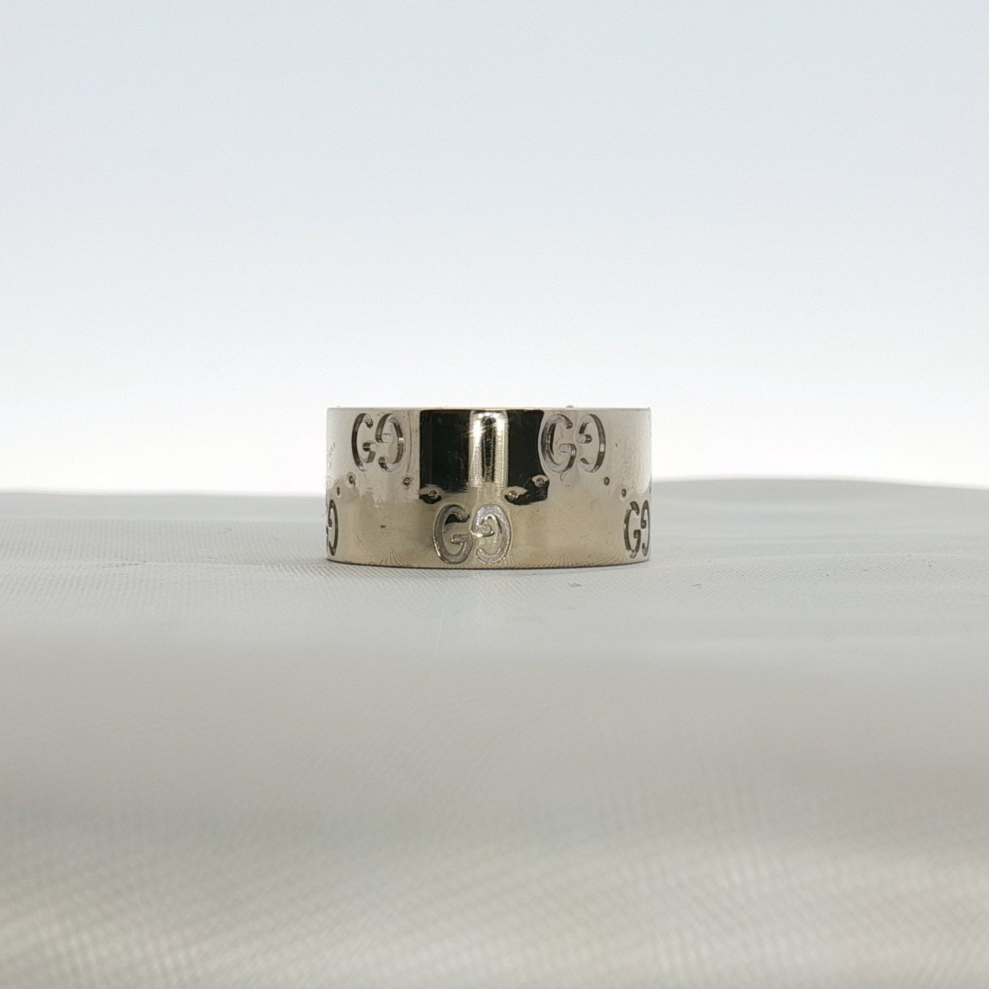 Gold & Beyond Gucci Interlocking G wide band ring in gold jewelry with iconic interlocking G design.