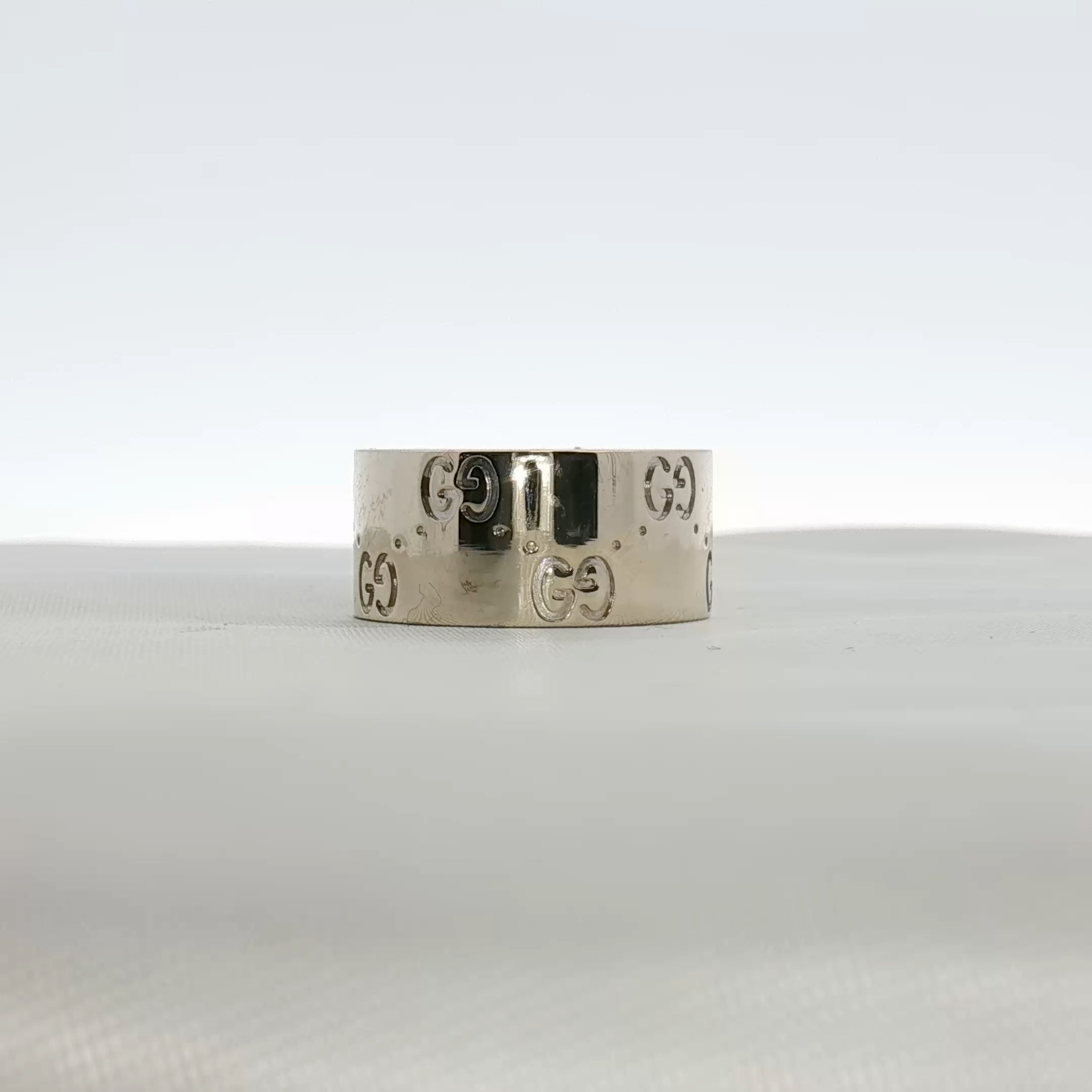 Gold & Beyond Gucci Interlocking G wide band jewelry ring with a bold, polished gold finish and signature interlocking G design.