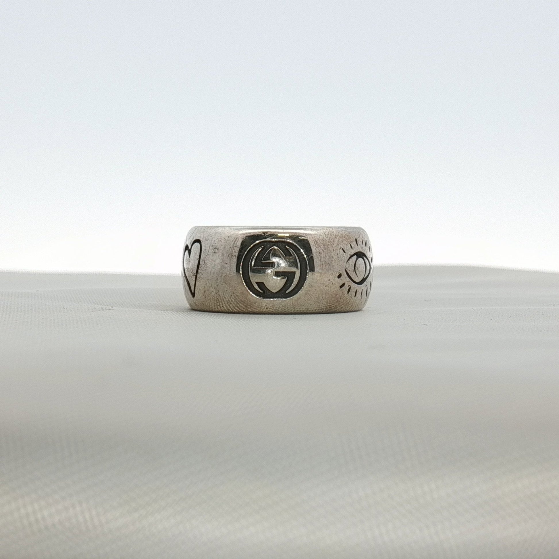 Gold & Beyond Gucci Blind for Love ring, elegant jewelry piece with a sleek gold band and distinctive design.