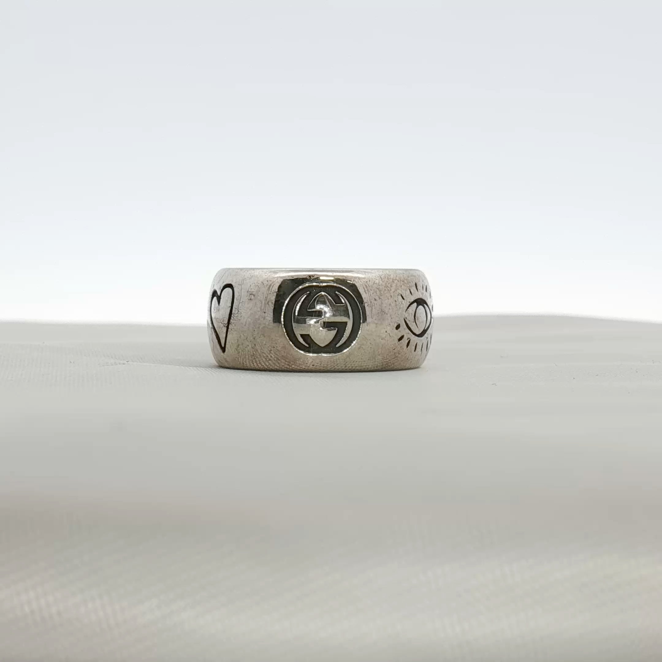 Gold & Beyond Gucci Blind for Love ring, elegant jewelry piece with a sleek gold band and distinctive design.