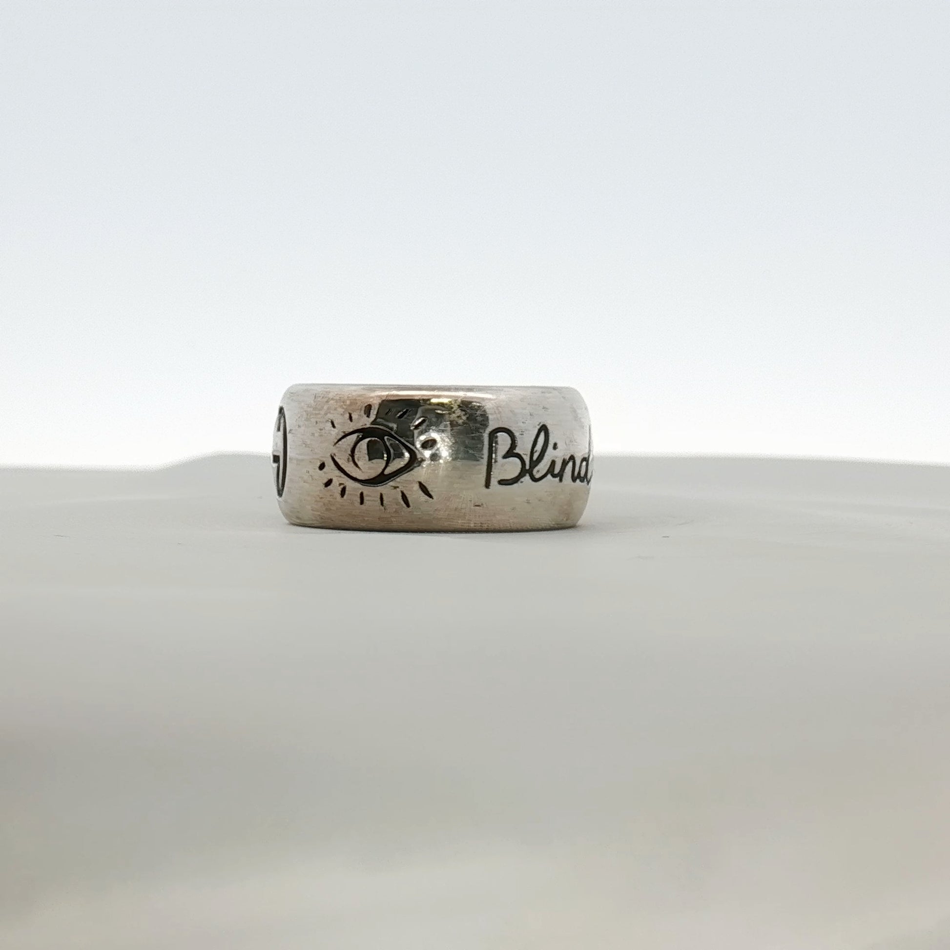 Gold & Beyond Gucci Blind for Love ring, elegant jewelry with a sleek gold band and subtle design details.