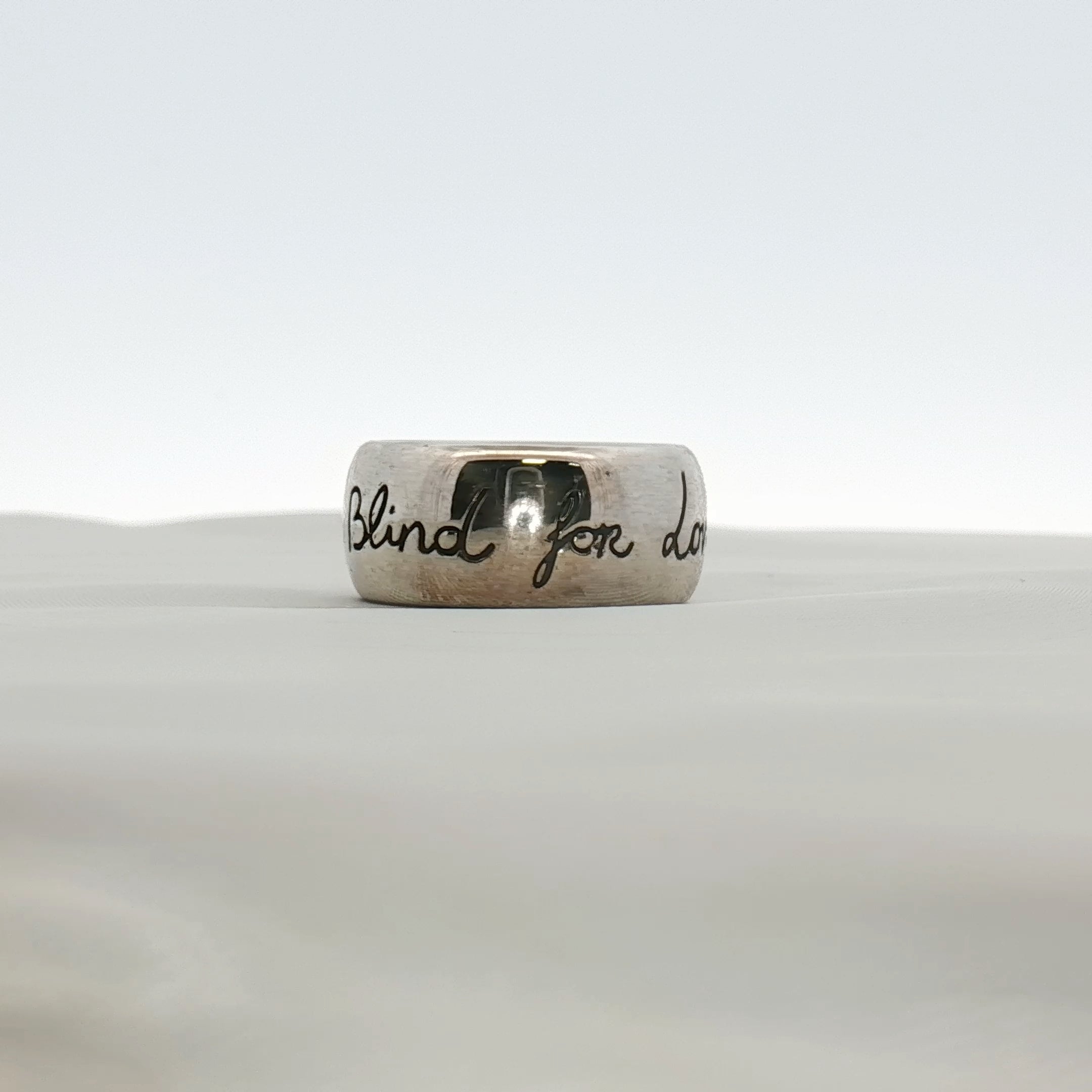 Gold & Beyond Gucci Blind for Love ring, elegant jewelry featuring a sleek gold band with intricate design details.
