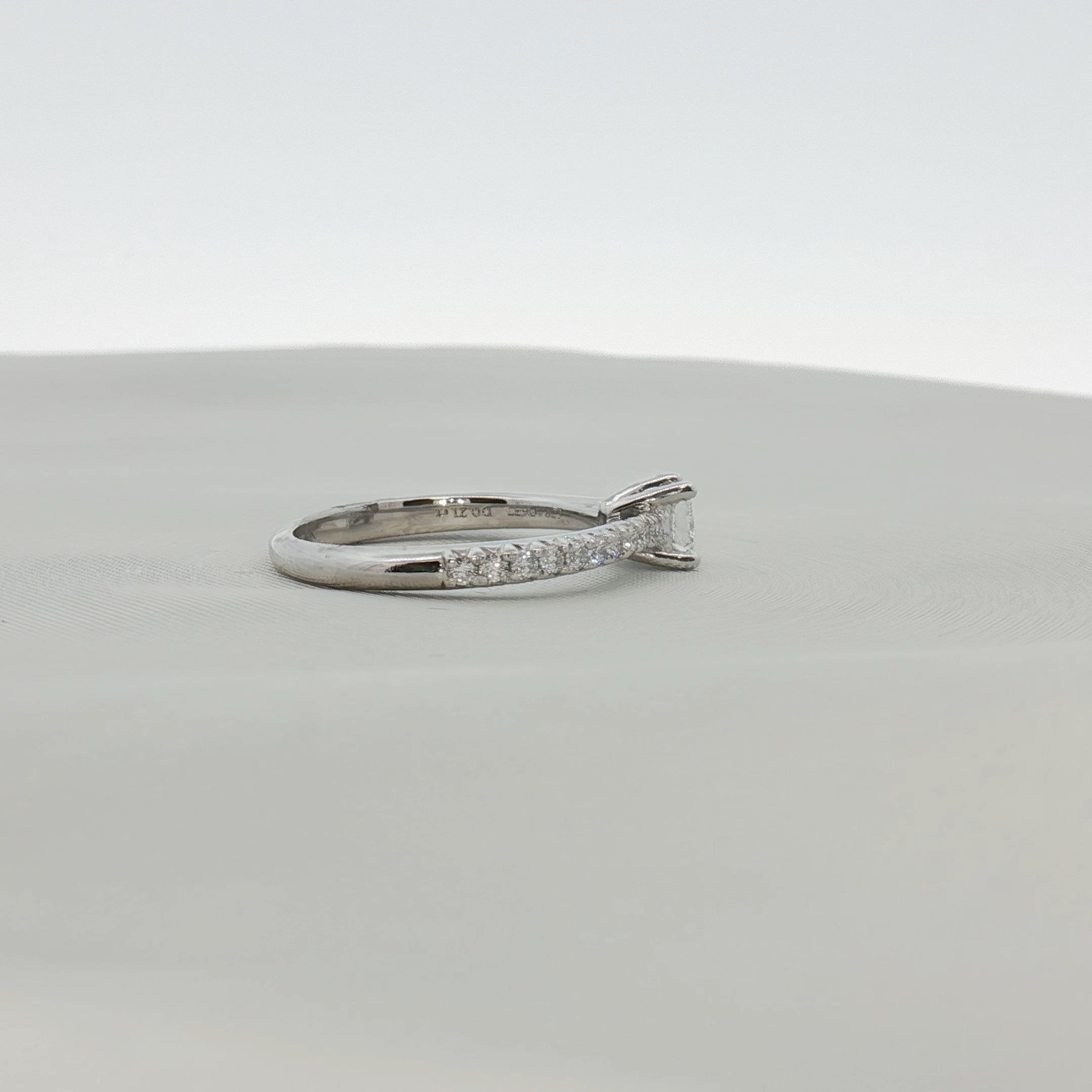 Gold & Beyond Tiffany & Co. Pavé Diamond Solitaire Engagement Ring featuring a sparkling center diamond and pavé setting in jewelry style.