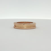 Gold & Beyond Bulgari B.Zero1 jewelry ring featuring a sleek, modern design in gold with distinctive circular motifs.