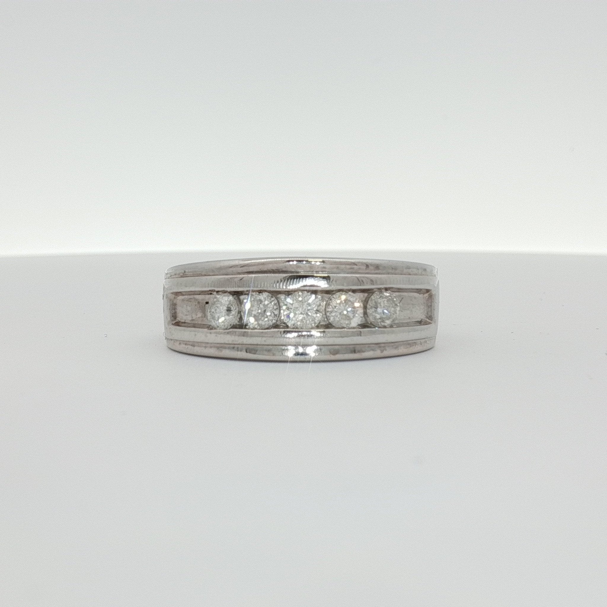 Men's 10K white gold wedding band with diamond accents from Gold & Beyond, showcasing a sleek, polished jewelry design.