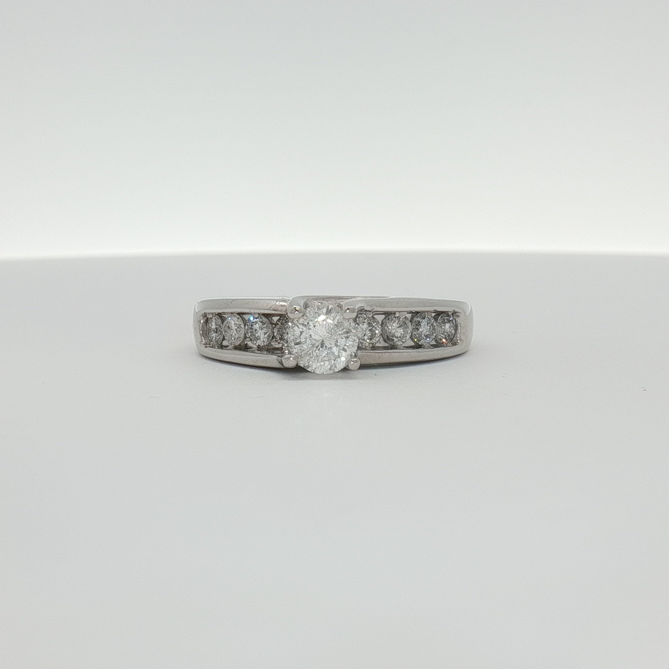 Platinum diamond ring from Gold & Beyond showcasing a sparkling diamond set in a sleek platinum band.