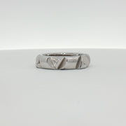 Louis Vuitton white gold Volt ring, elegant jewelry piece with sleek design, displayed on a neutral background.