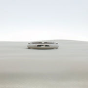 Gold & Beyond Tiffany & Co. Together wedding band in jewelry, featuring sleek gold design on a plain background.