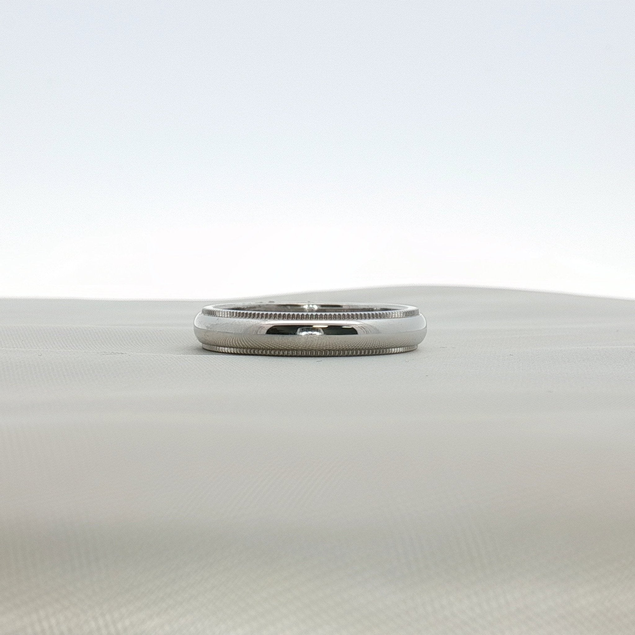 Gold & Beyond Tiffany & Co. Together wedding band, elegant gold jewelry with a sleek, polished design for special occasions.