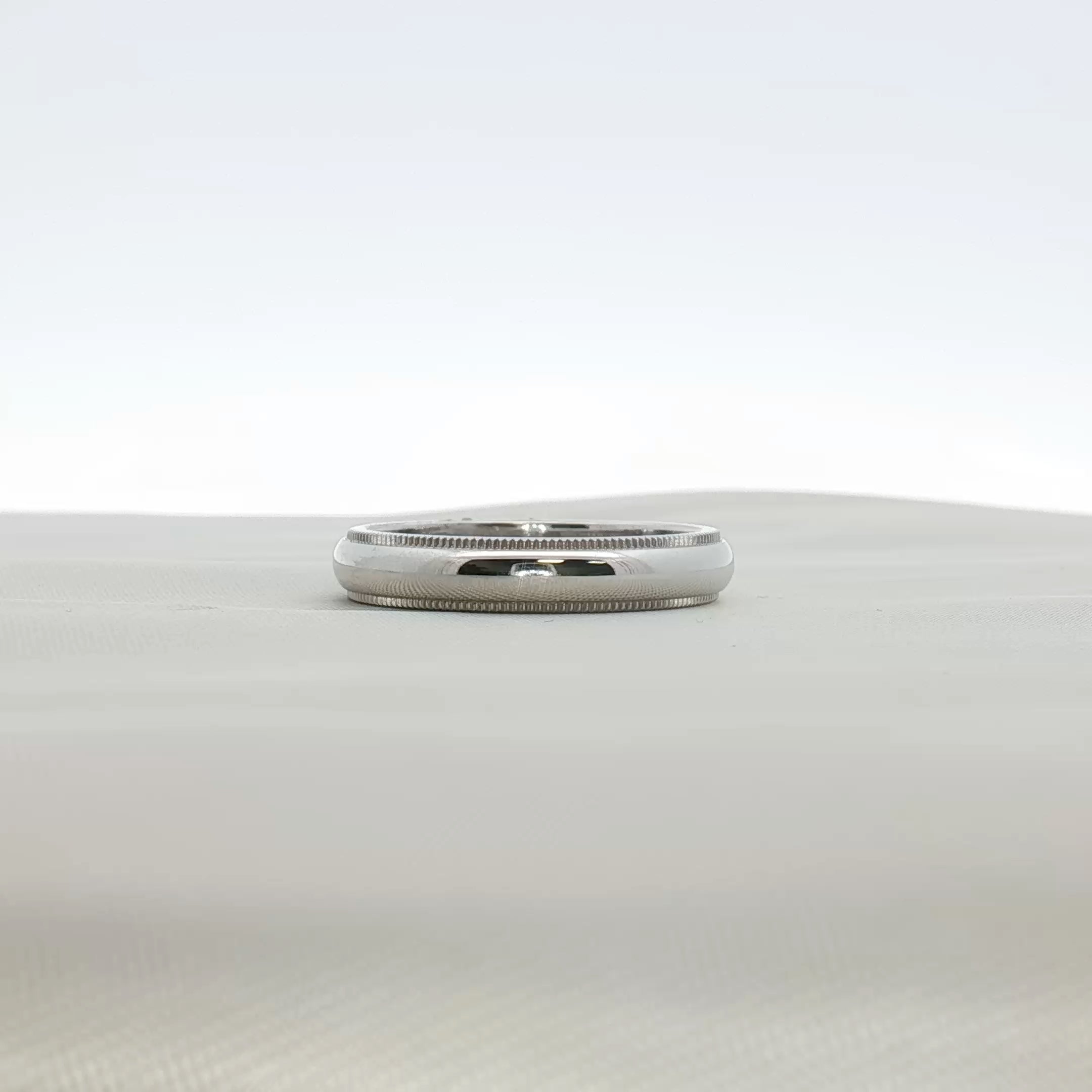 Gold & Beyond Tiffany & Co. Together wedding band, elegant gold jewelry with a sleek, polished finish and classic design.