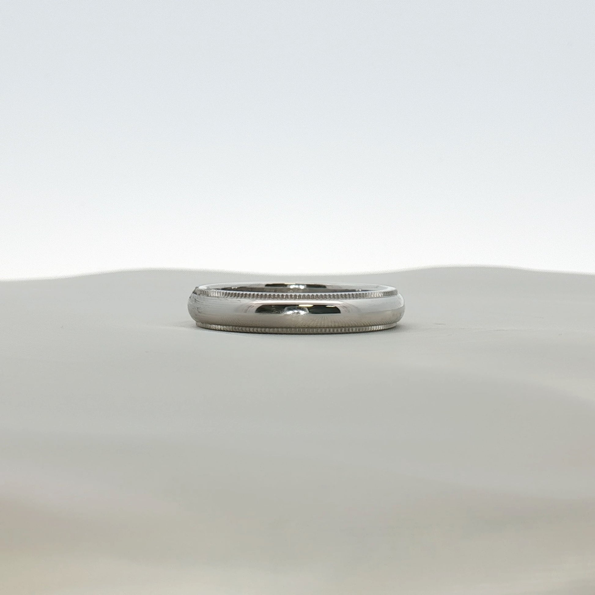 Gold & Beyond Tiffany & Co. Together wedding band jewelry in gold, showcasing a sleek, matching design for couples.